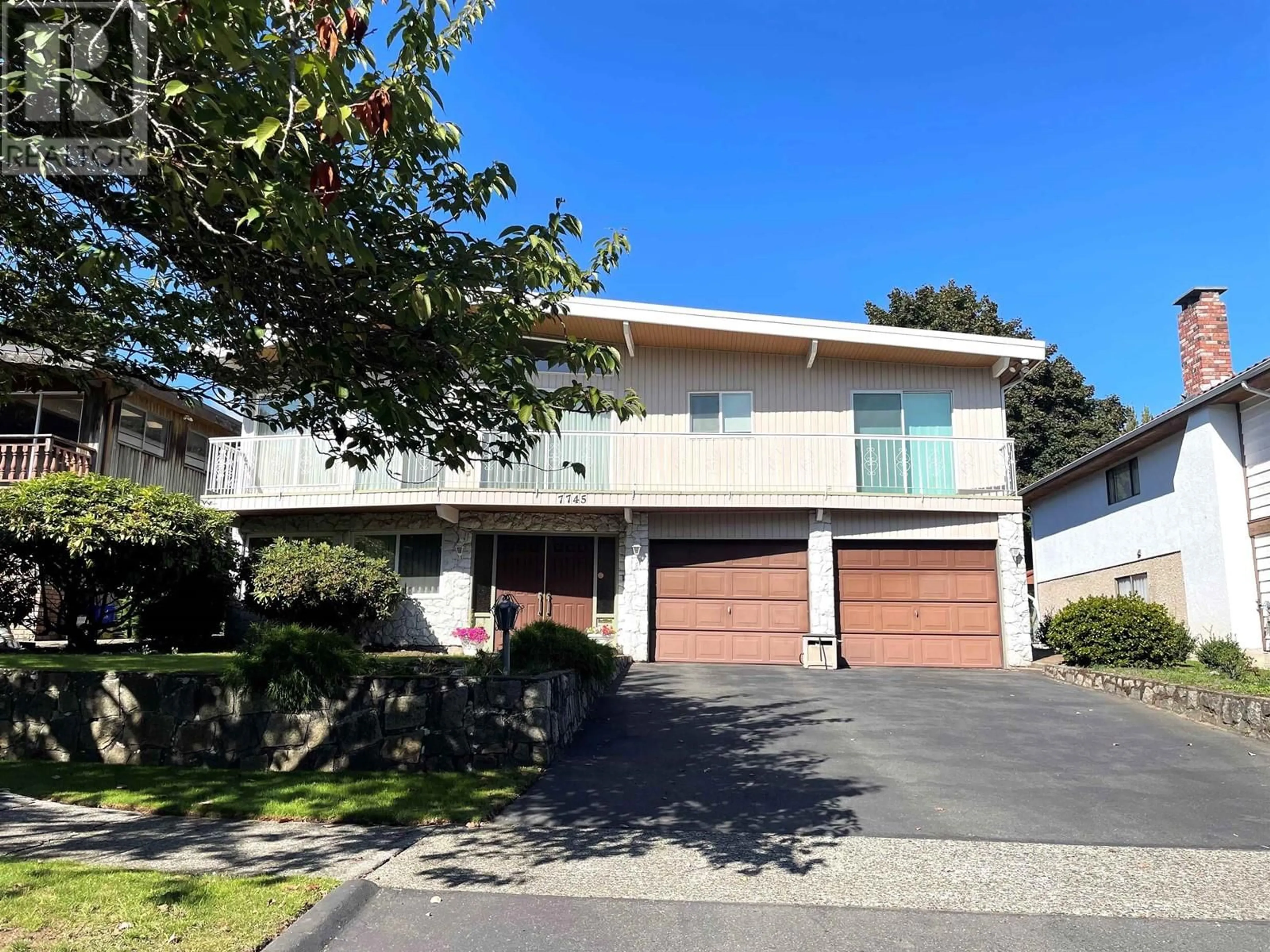 Frontside or backside of a home for 7745 MUNROE CRESCENT, Vancouver British Columbia V5S3J9