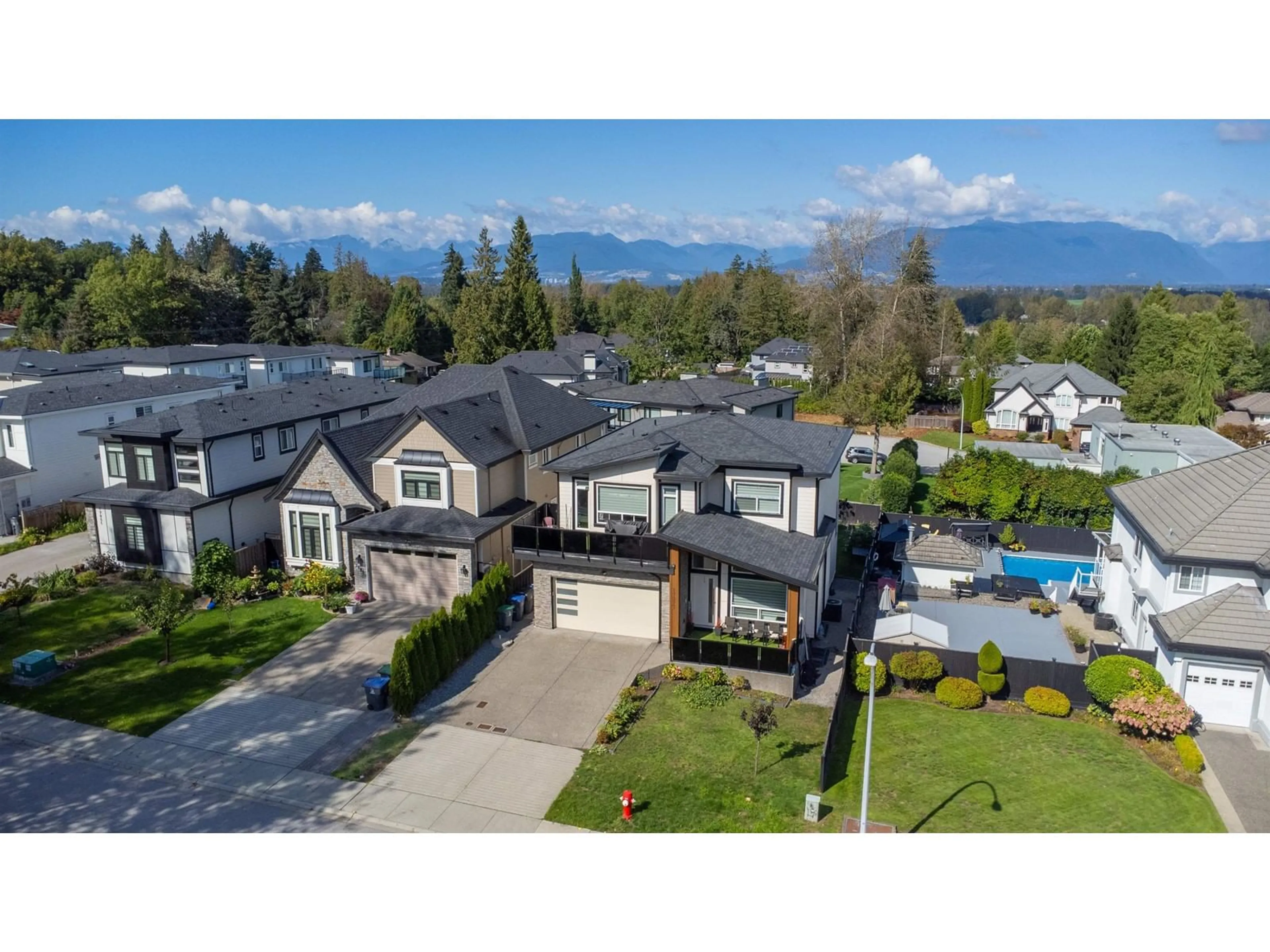 A pic from outside/outdoor area/front of a property/back of a property/a pic from drone, mountain view for 17977 98 AVENUE, Surrey British Columbia V4N4V5