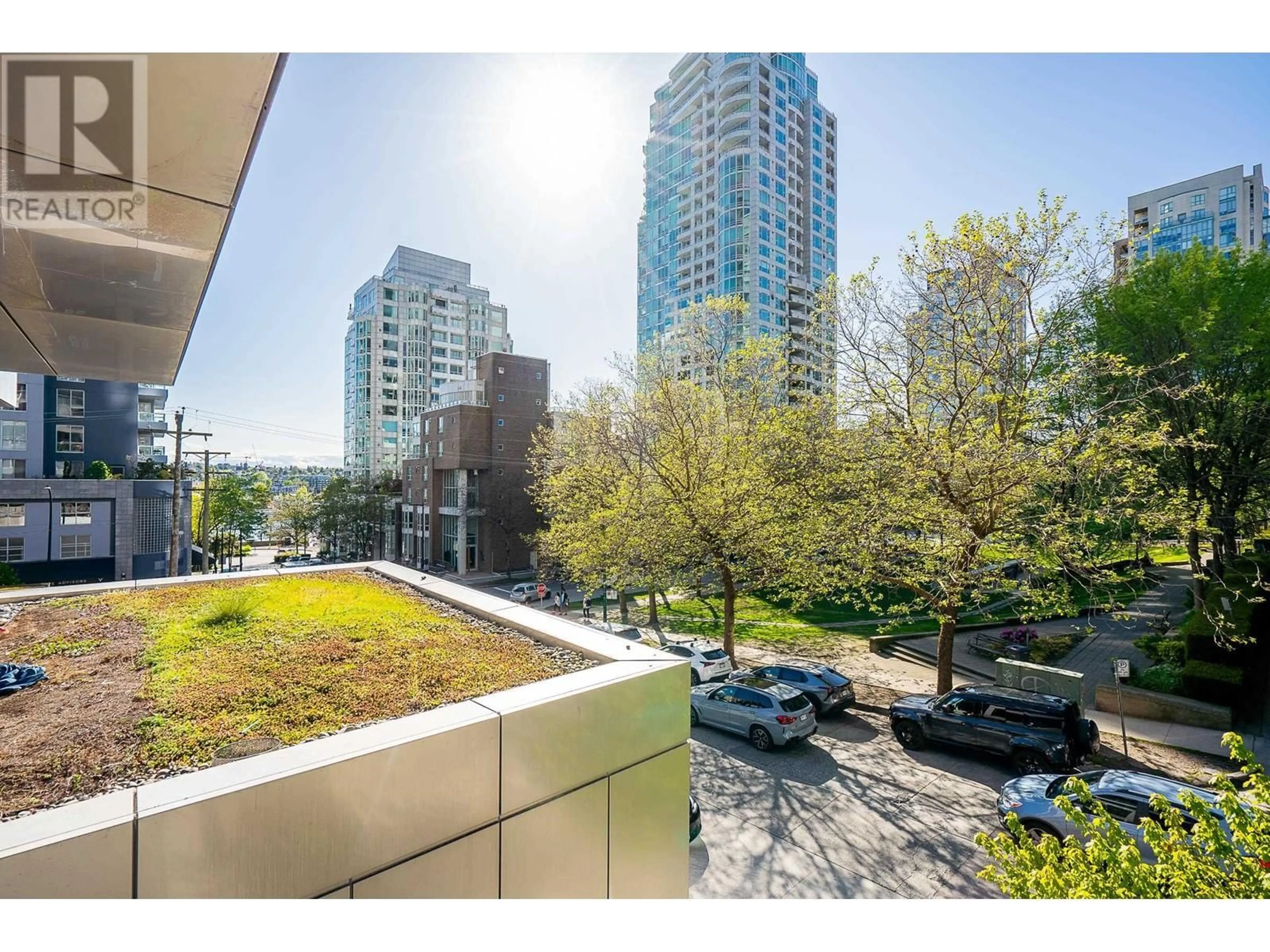 A pic from exterior of the house or condo, the view of city buildings for 301 1480 HOWE STREET, Vancouver British Columbia V6Z0G5