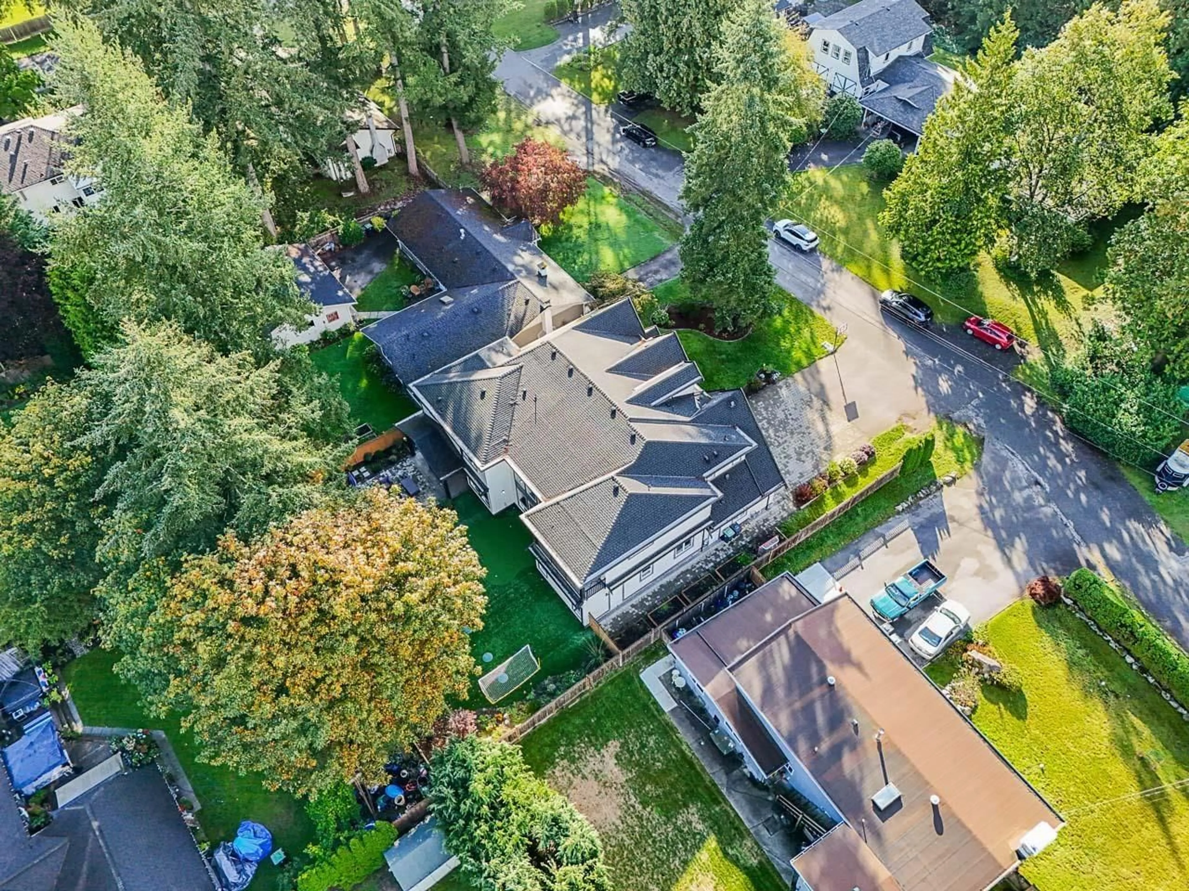 Frontside or backside of a home, the fenced backyard for 20103 41A AVENUE, Langley British Columbia V3S6B2