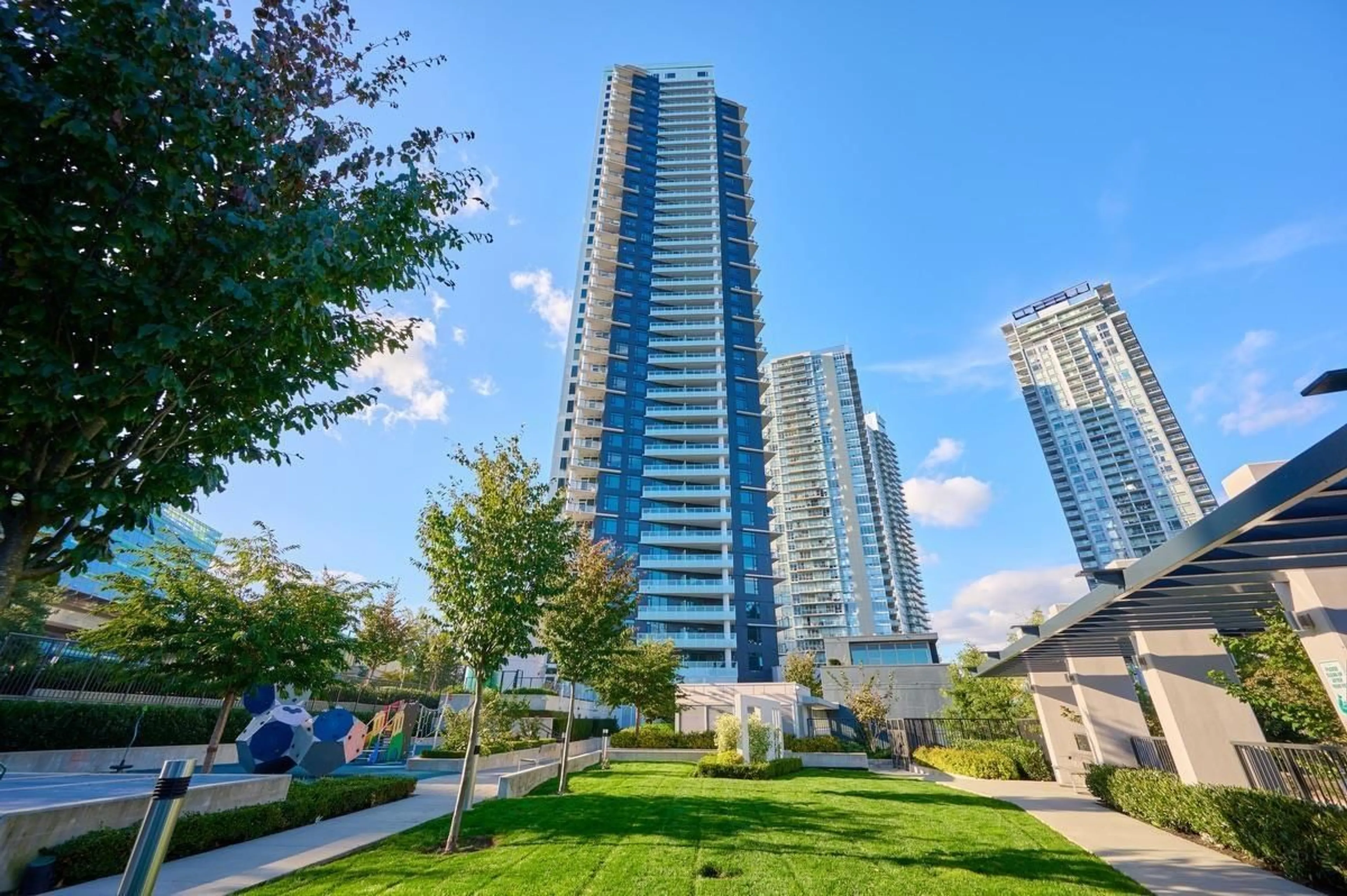 A pic from exterior of the house or condo, the view of city buildings for 308 9887 WHALLEY BOULEVARD, Surrey British Columbia V3T0P4