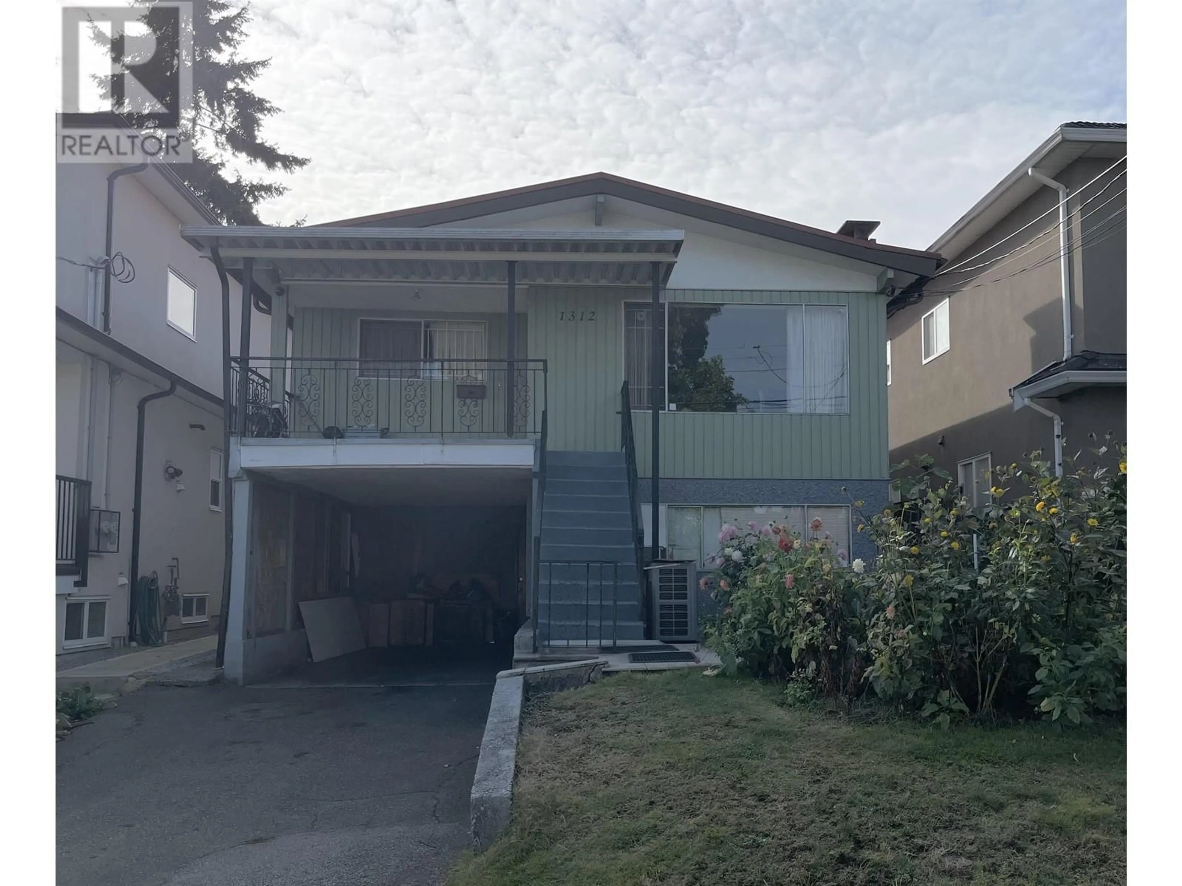 Frontside or backside of a home, the street view for 1312 E 28TH AVENUE, Vancouver British Columbia V5V2R1