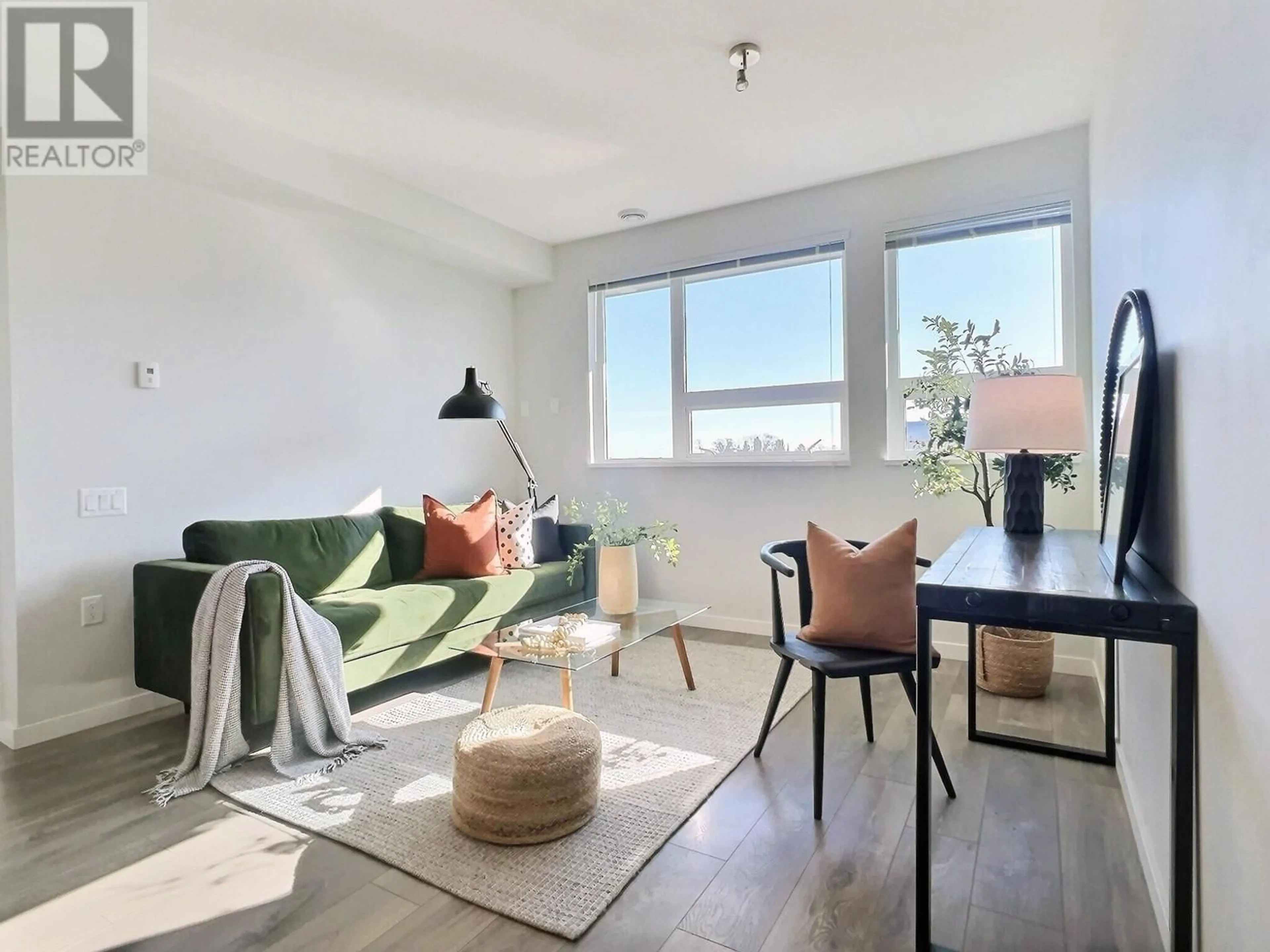 Living room, wood floors for 506 3289 RIVERWALK AVENUE, Vancouver British Columbia V5S0G2