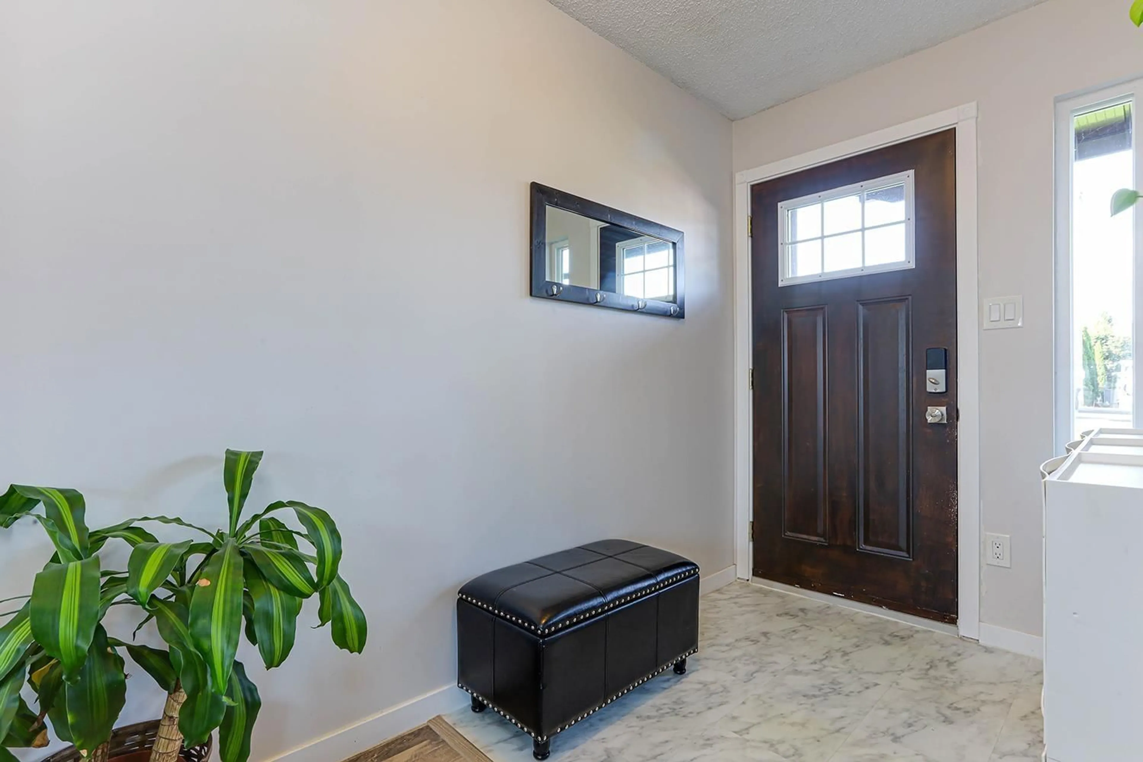 Indoor entryway, wood floors for 9438 213 STREET, Langley British Columbia V1M1T2