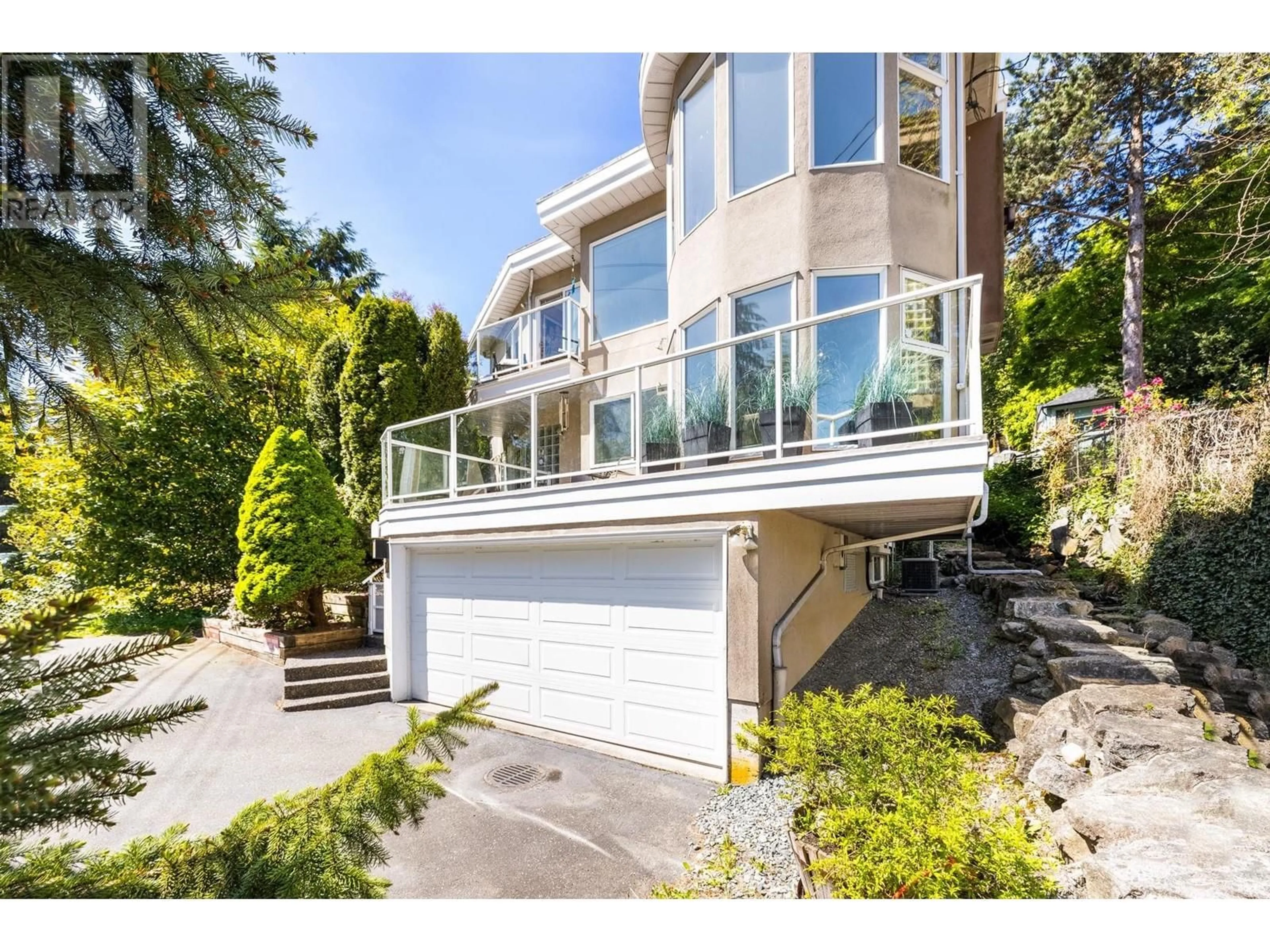 Frontside or backside of a home, the street view for 2171 DEEP COVE ROAD, North Vancouver British Columbia V7G1S8