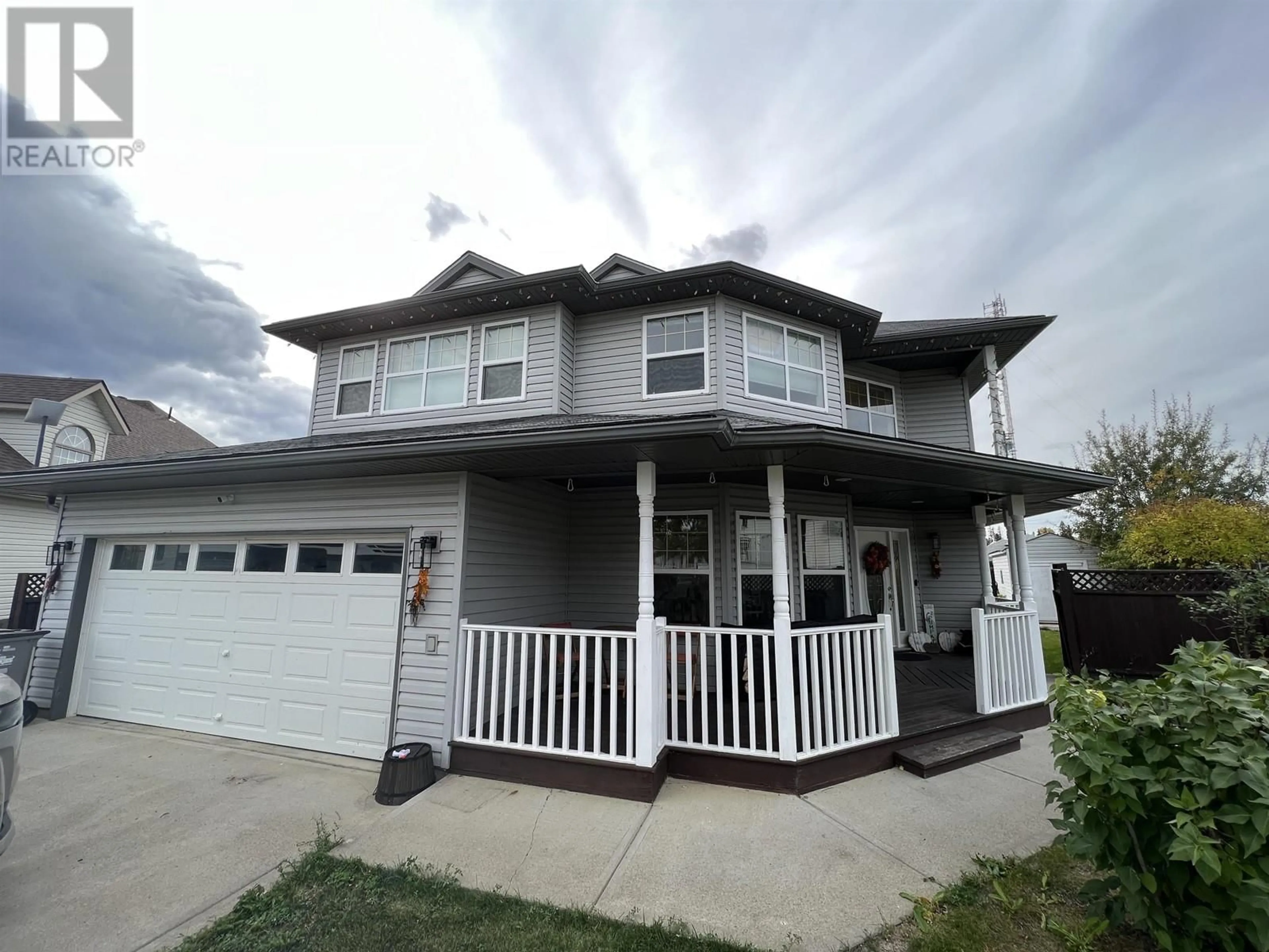 Home with vinyl exterior material, street for 5615 ANGUS COURT, Fort Nelson British Columbia V0C1R0