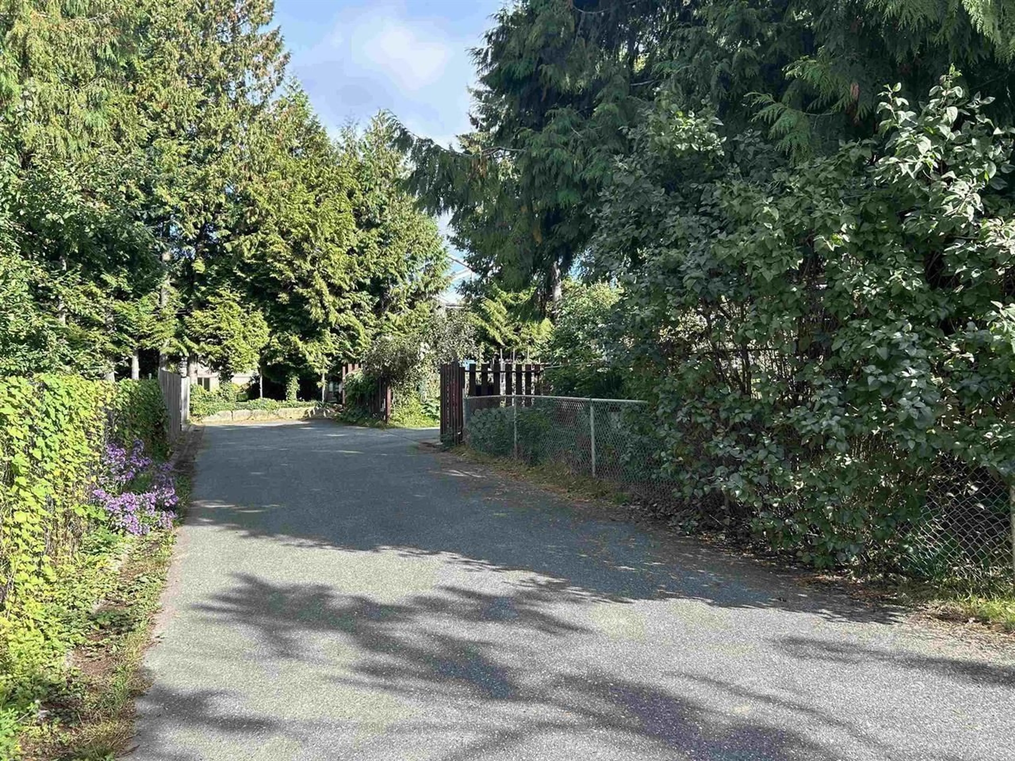 A pic from outside/outdoor area/front of a property/back of a property/a pic from drone, street for 10297 144A, Surrey British Columbia V3R6M8