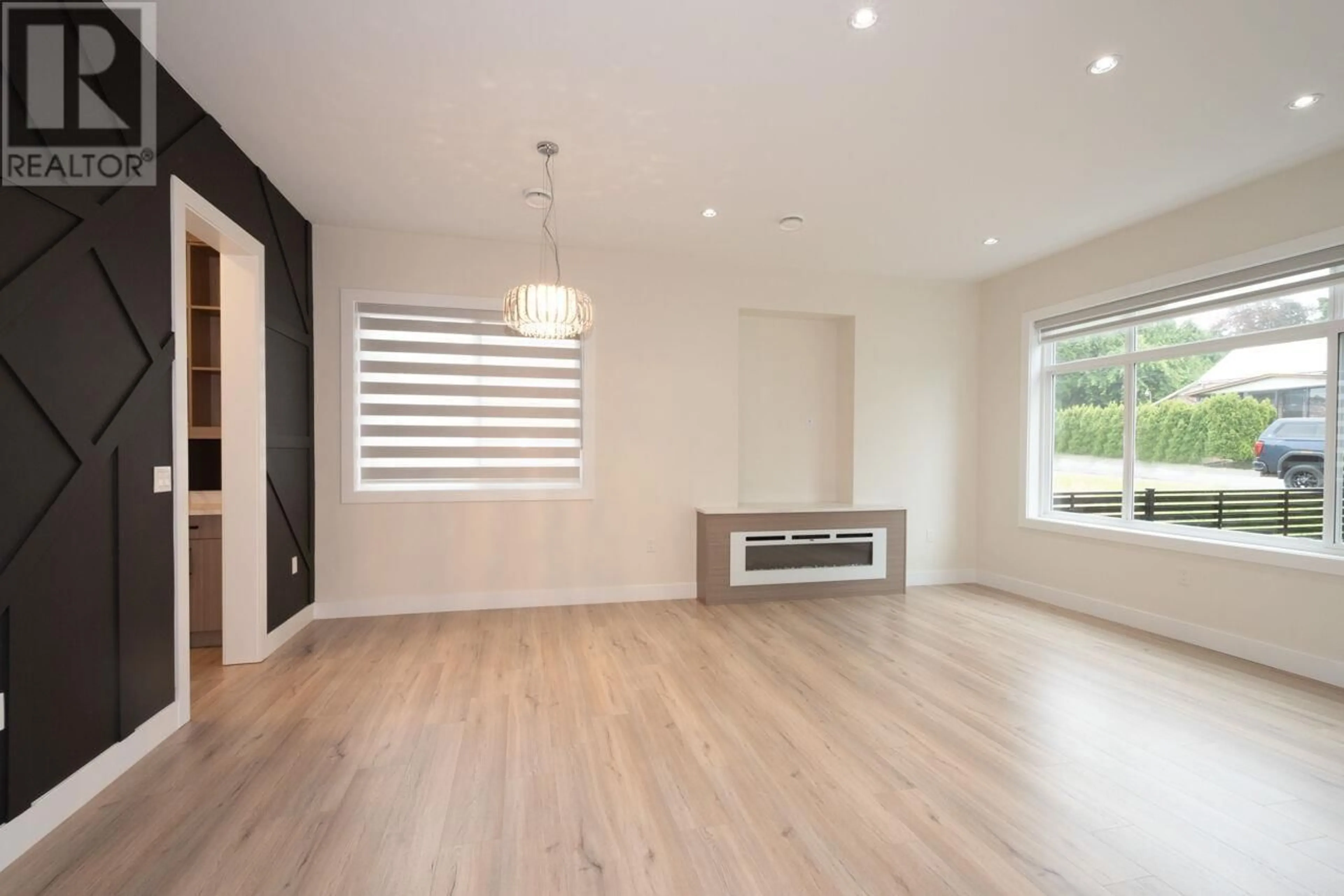 A pic of a room, wood floors for 8563 11TH AVENUE, Burnaby British Columbia V3N2P6