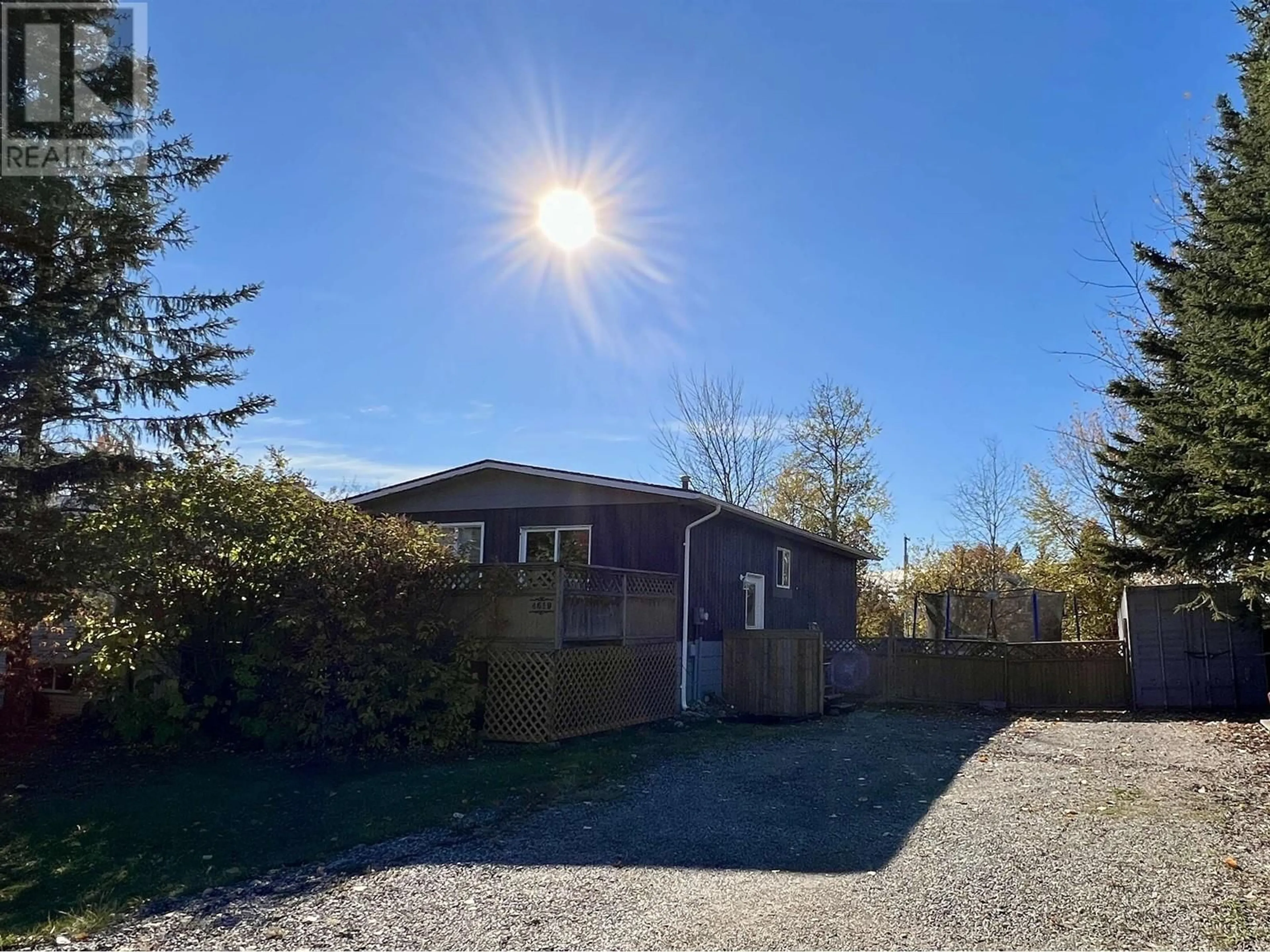 A pic from outside/outdoor area/front of a property/back of a property/a pic from drone, unknown for 4619 SPRUCE AVENUE, Fort Nelson British Columbia V0C1R0