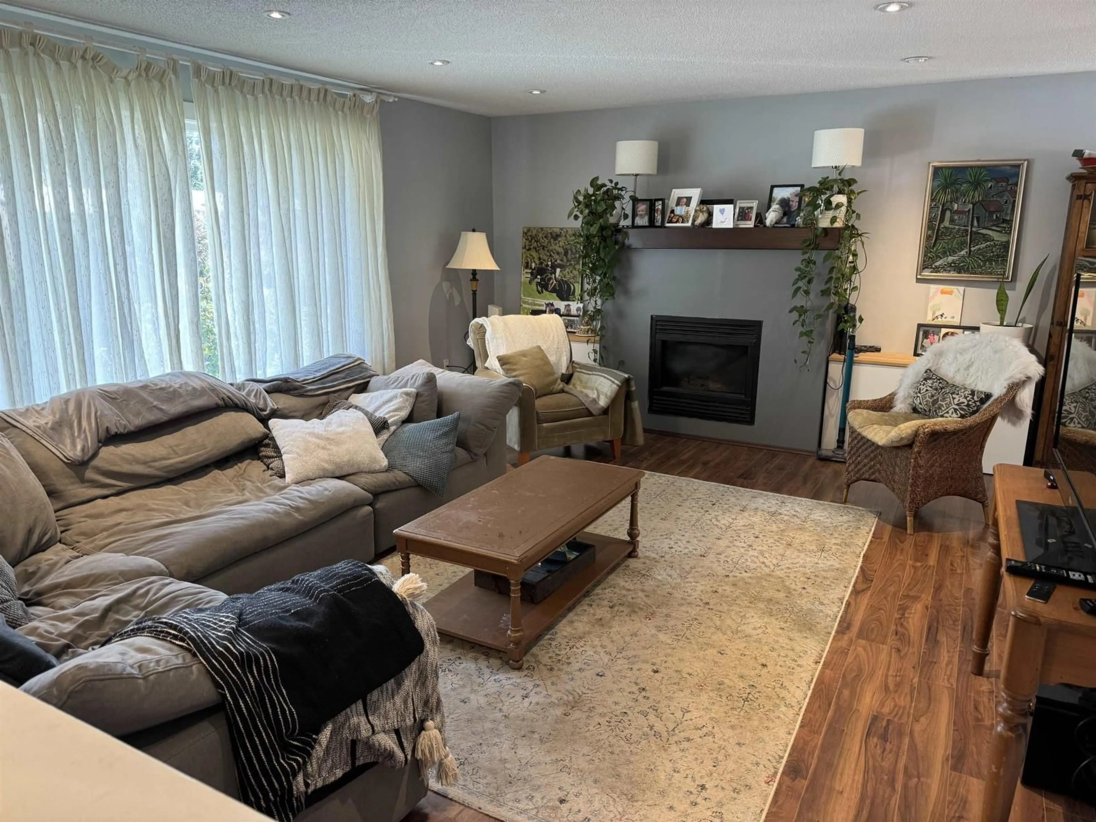 Living room with furniture, wood/laminate floor for 604 LAKBERG CRESCENT, Harrison Hot Springs British Columbia V0M1K0