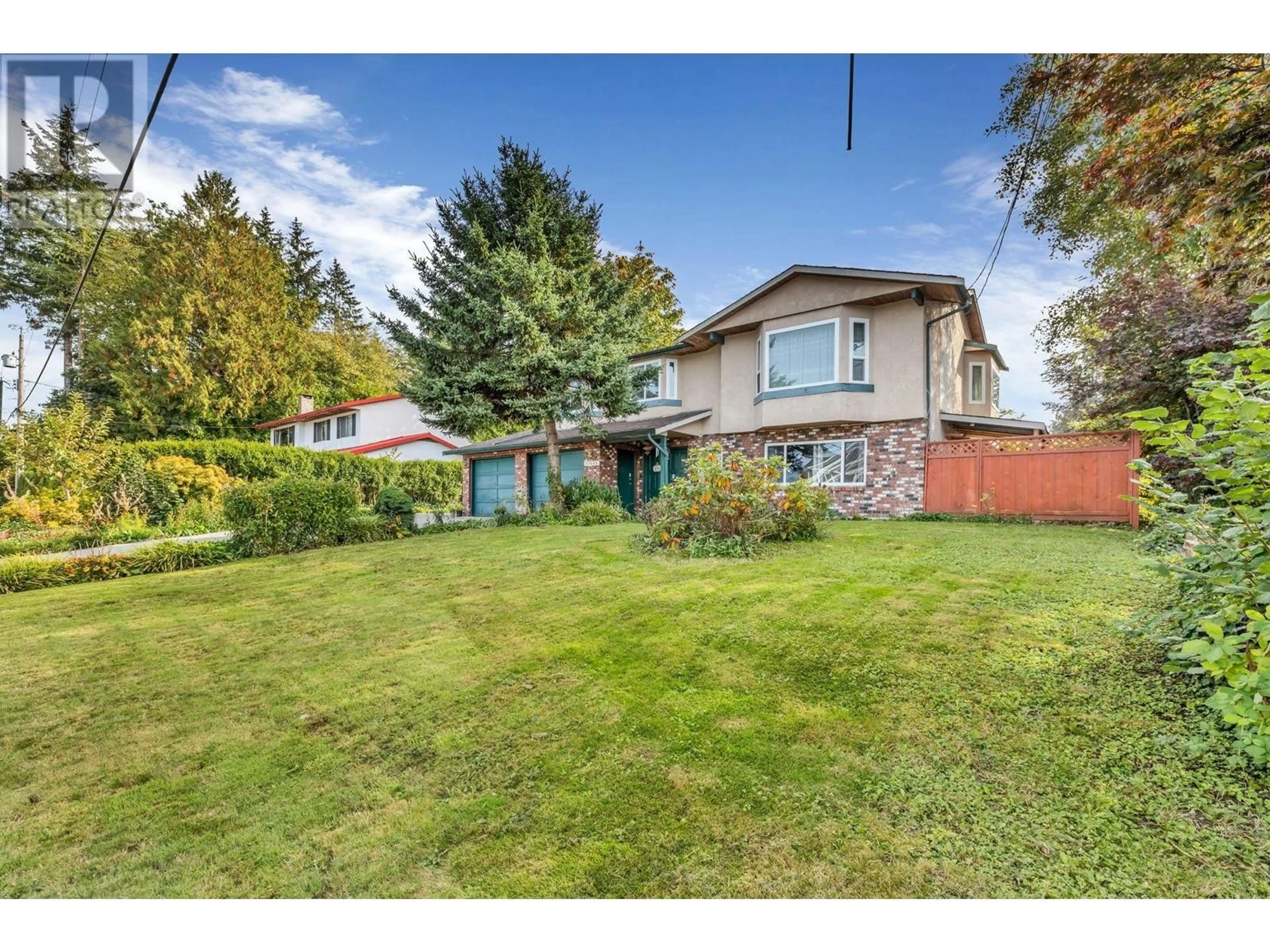 Frontside or backside of a home, the fenced backyard for 22502 124 AVENUE, Maple Ridge British Columbia V2X4J8