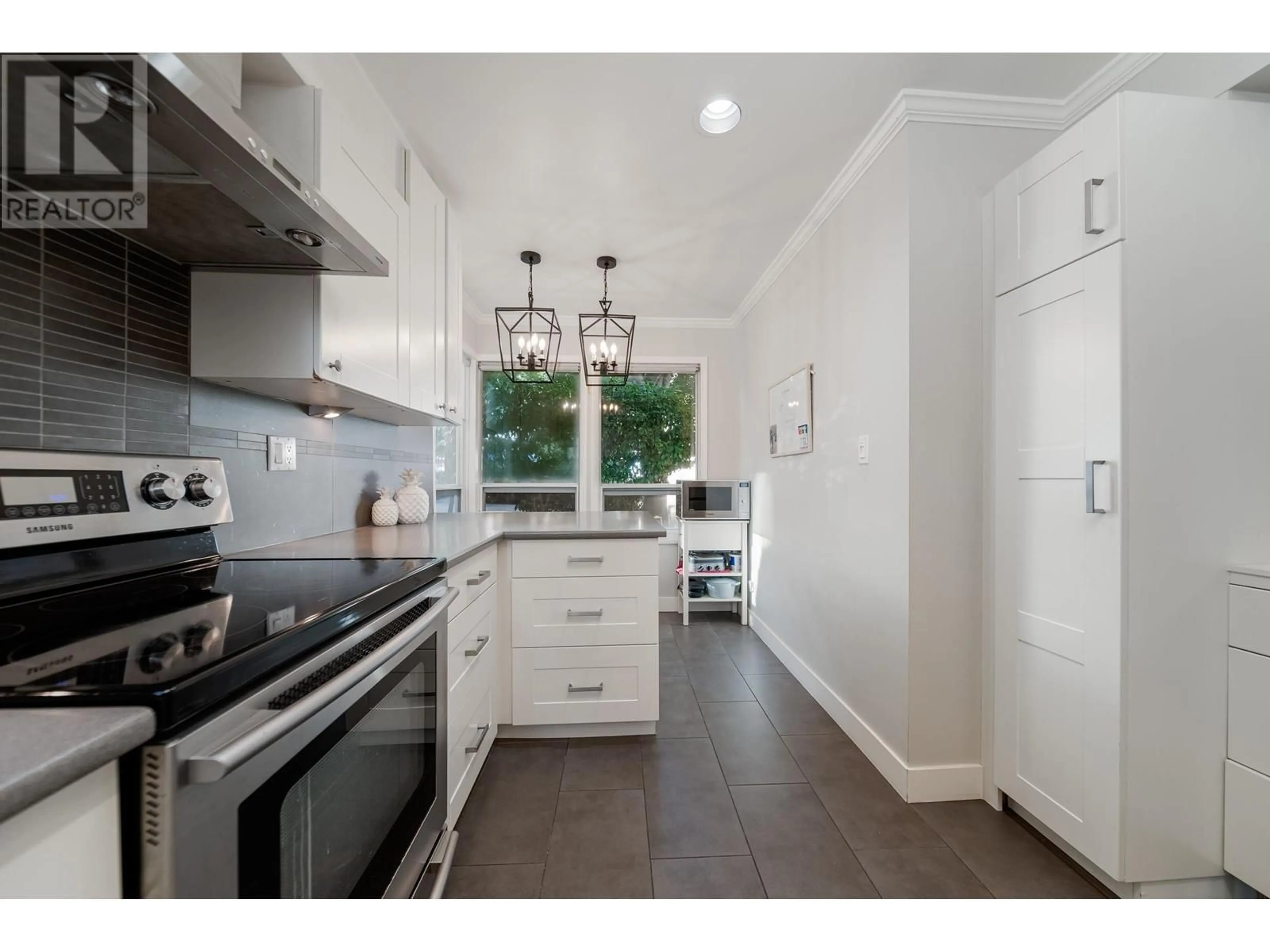 Open concept kitchen for 8481 PORTSIDE COURT, Vancouver British Columbia V5P4V4