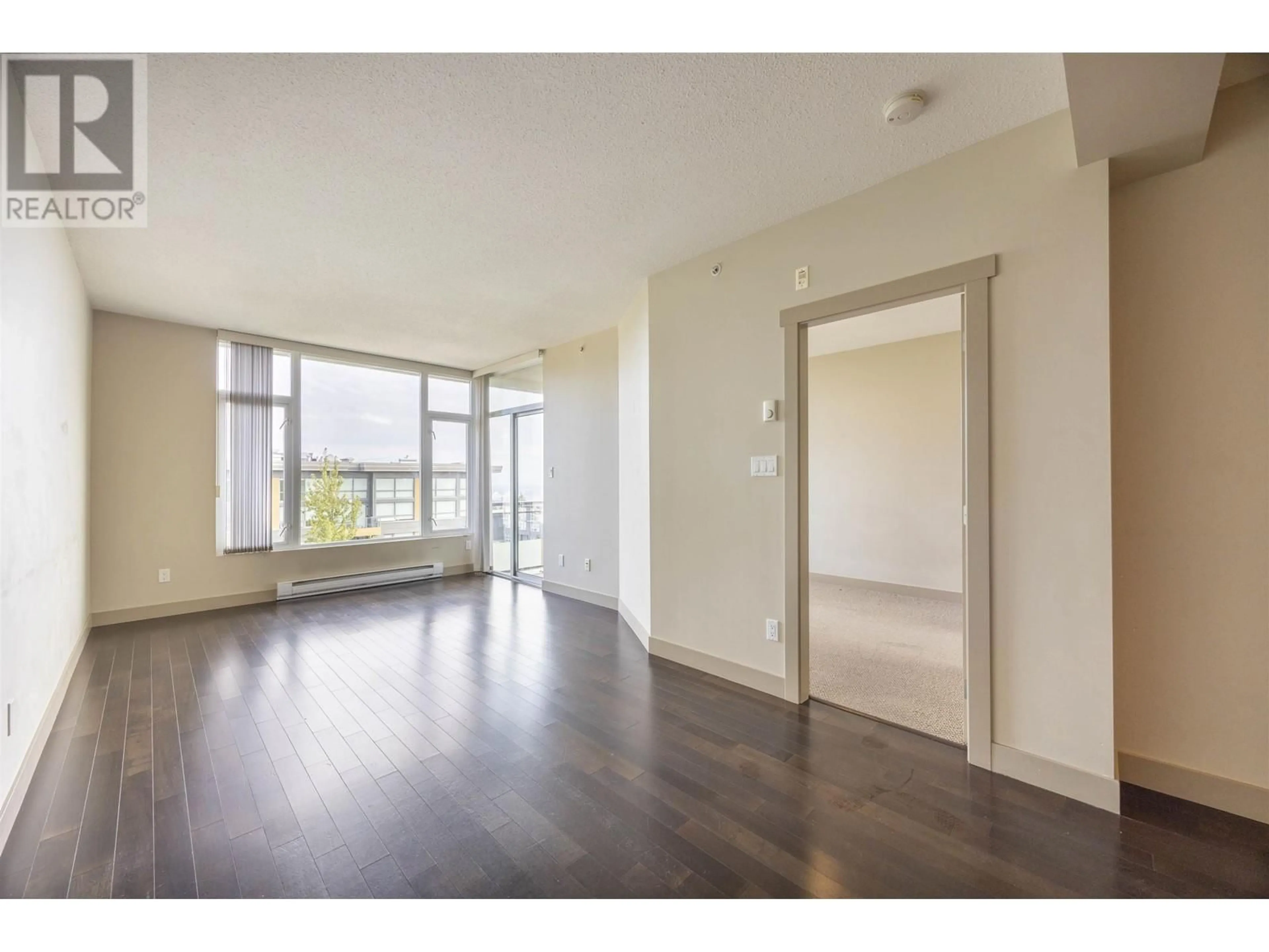 A pic of a room, wood floors for 715 9009 CORNERSTONE MEWS, Burnaby British Columbia V5A0B9