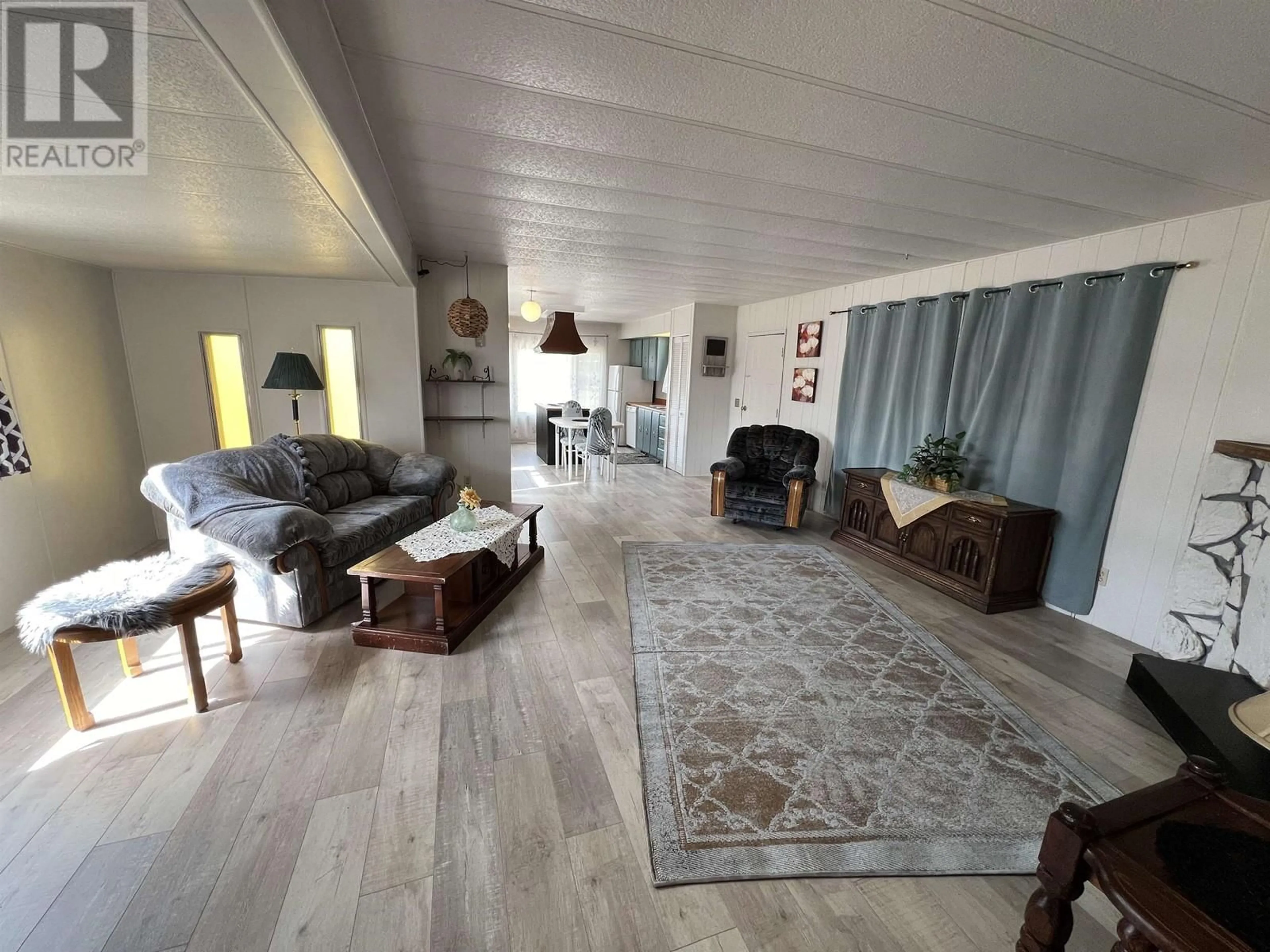 Living room, wood floors for 31 4501 NAHANNI DRIVE, Fort Nelson British Columbia V0C1R0