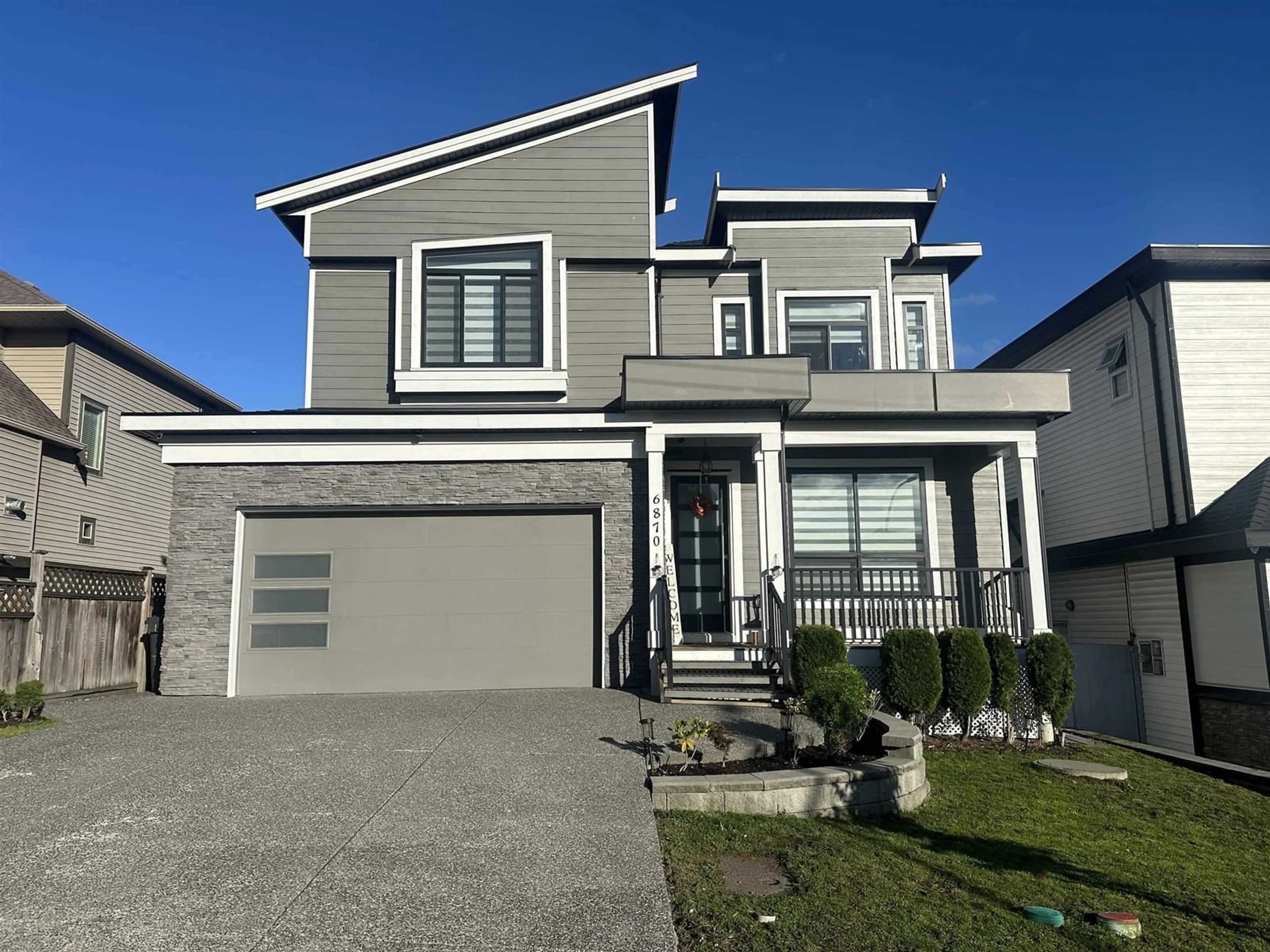 Frontside or backside of a home, the street view for 6870 197B STREET, Langley British Columbia V2Y3H4