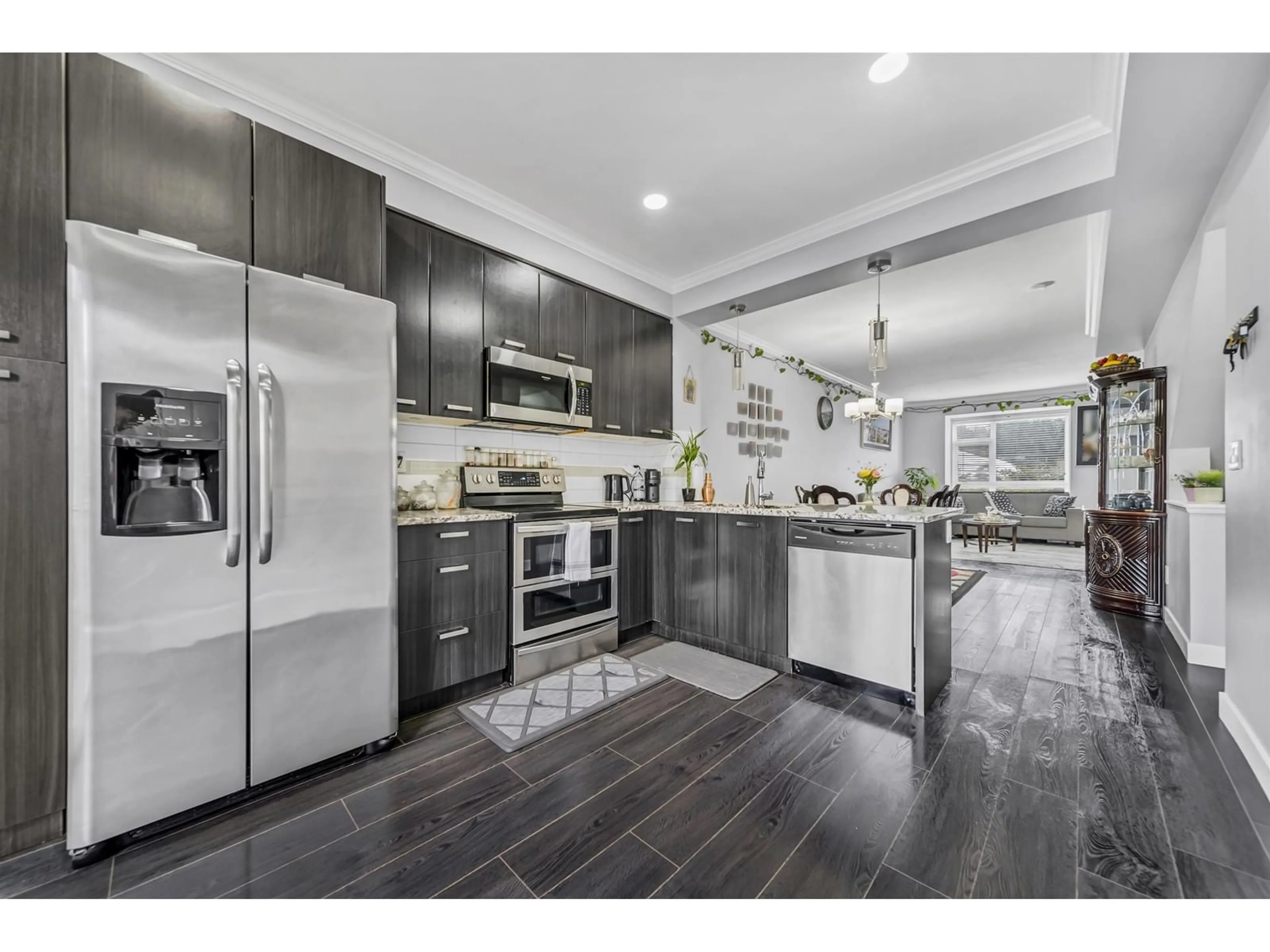 Open concept kitchen, ceramic/tile floor for 131 5888 144 STREET, Surrey British Columbia V3X0G8