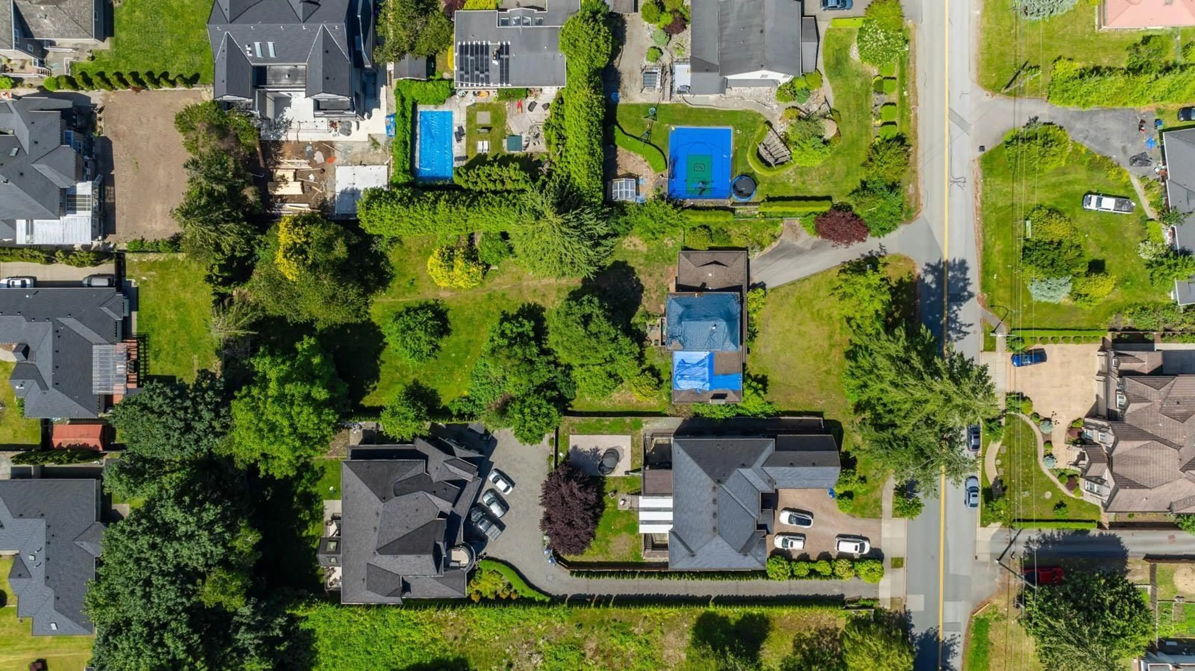 A pic from outside/outdoor area/front of a property/back of a property/a pic from drone, street for 5661 146 STREET, Surrey British Columbia V3S2Z5