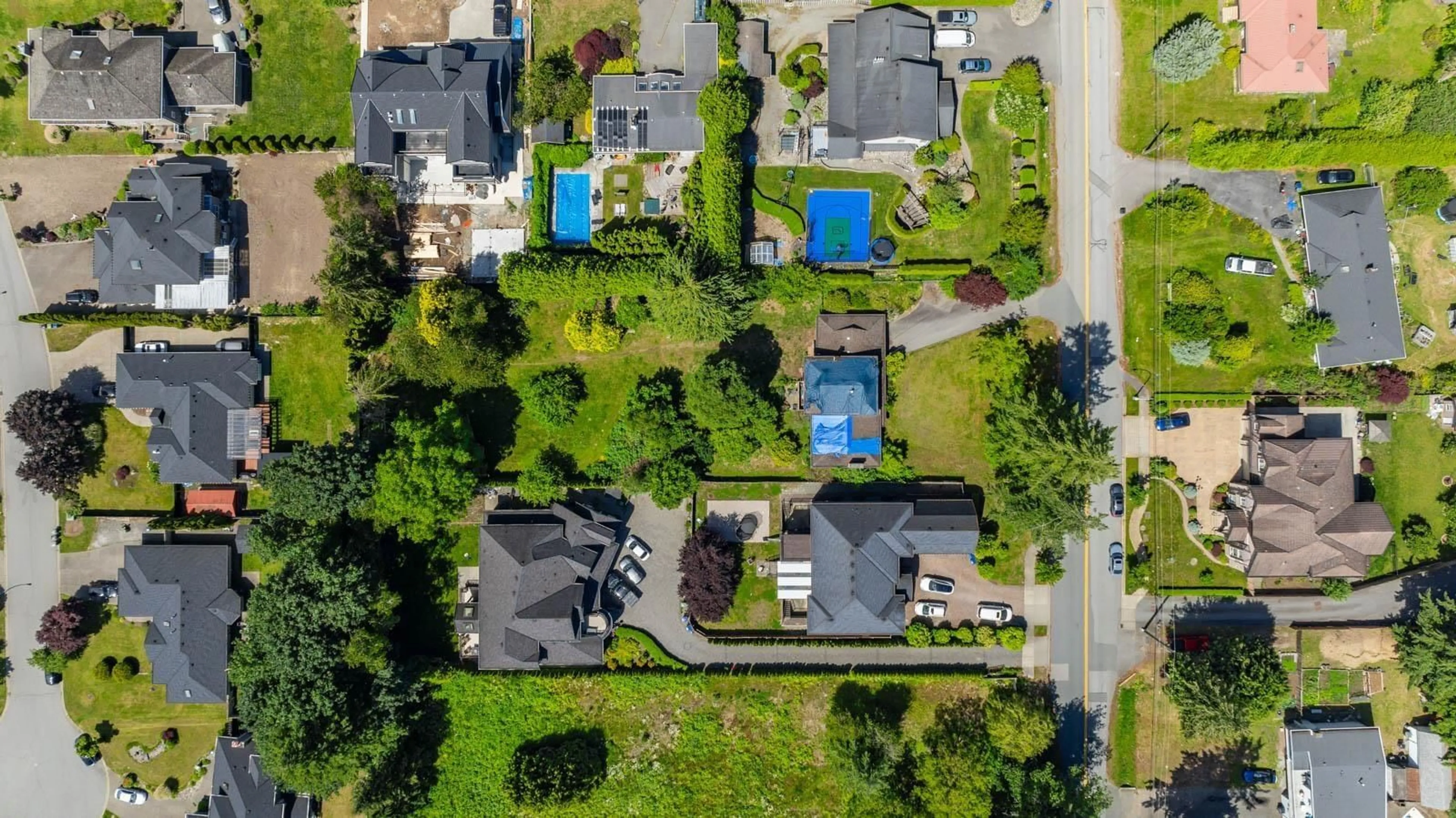 A pic from outside/outdoor area/front of a property/back of a property/a pic from drone, street for 5661 146 STREET, Surrey British Columbia V3S2Z5