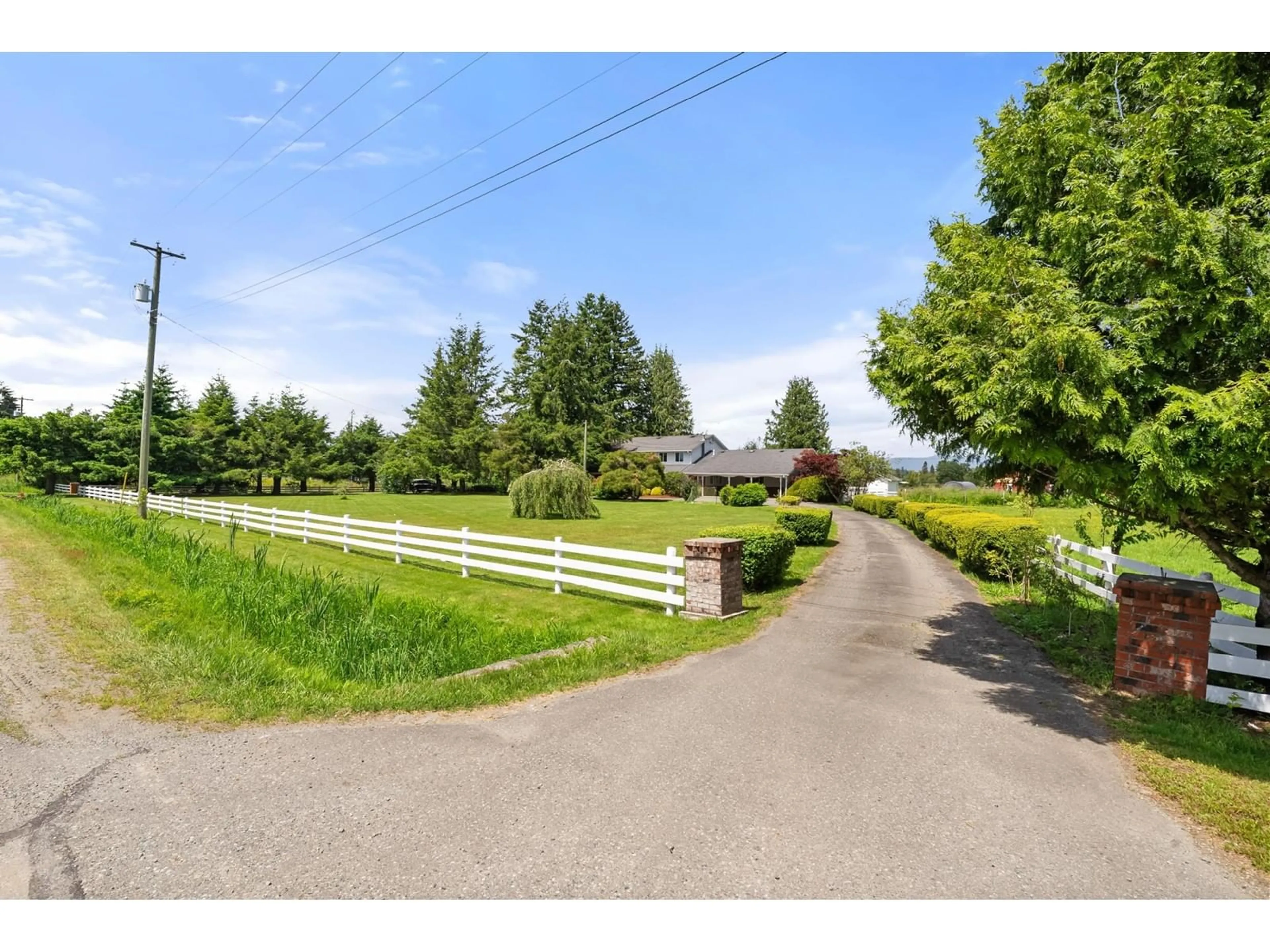 Frontside or backside of a home, the fenced backyard for 22061 64 AVENUE, Langley British Columbia V2Y2N8