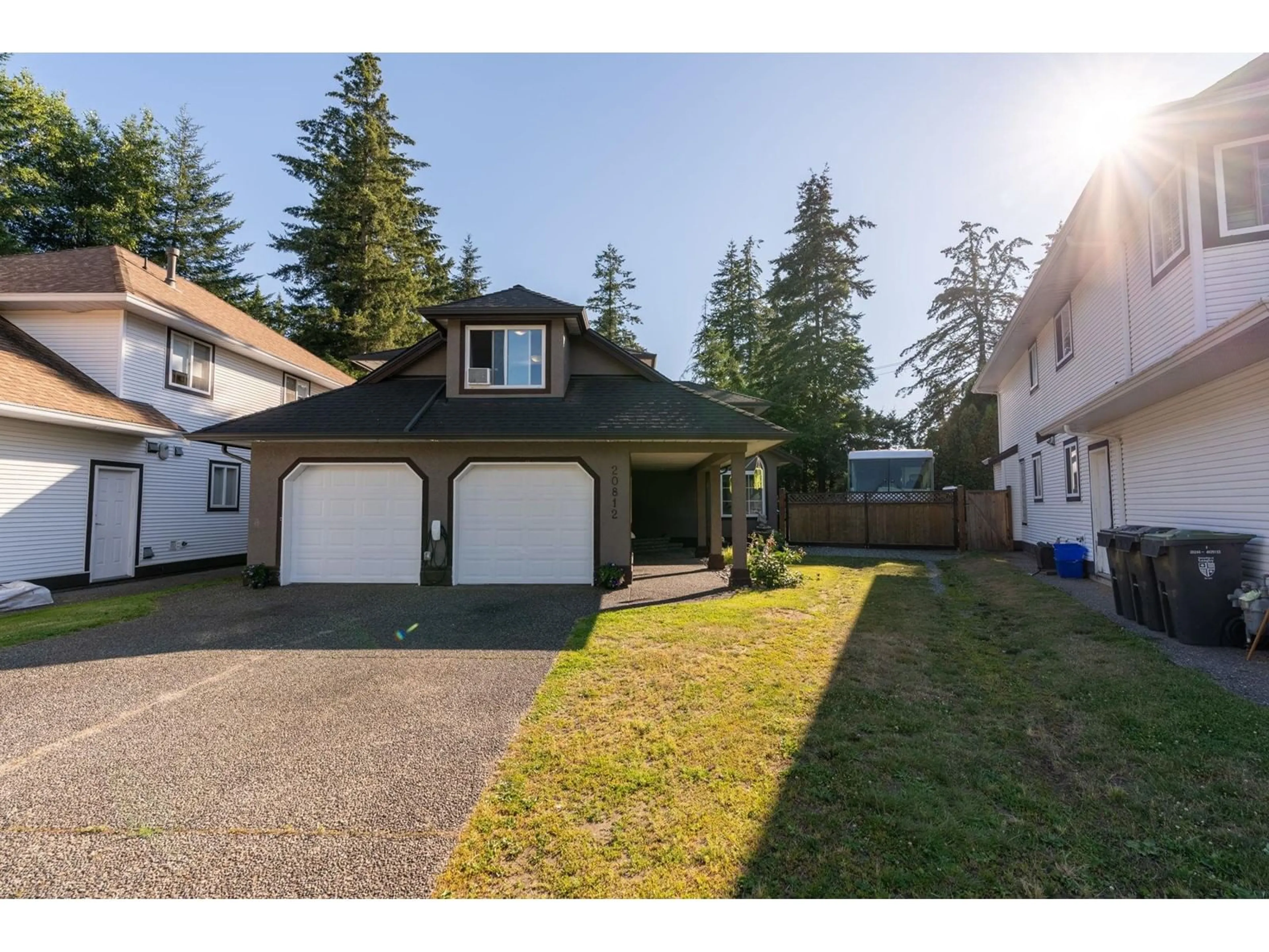 Frontside or backside of a home, the fenced backyard for 20812 43 AVENUE, Langley British Columbia V3A7Z6