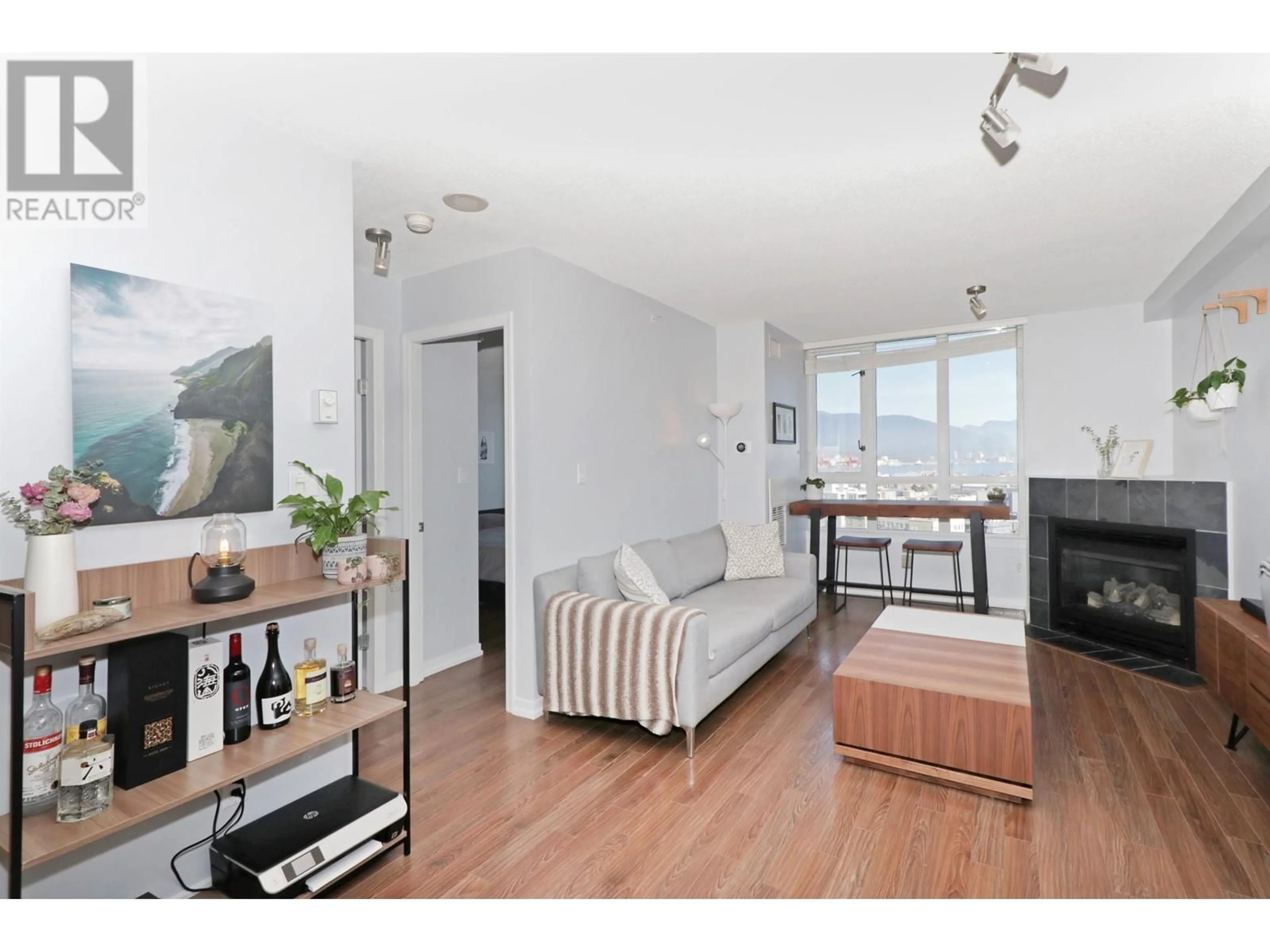 Living room with furniture, wood/laminate floor for 2207 - 63 KEEFER PLACE, Vancouver British Columbia V6B6N6