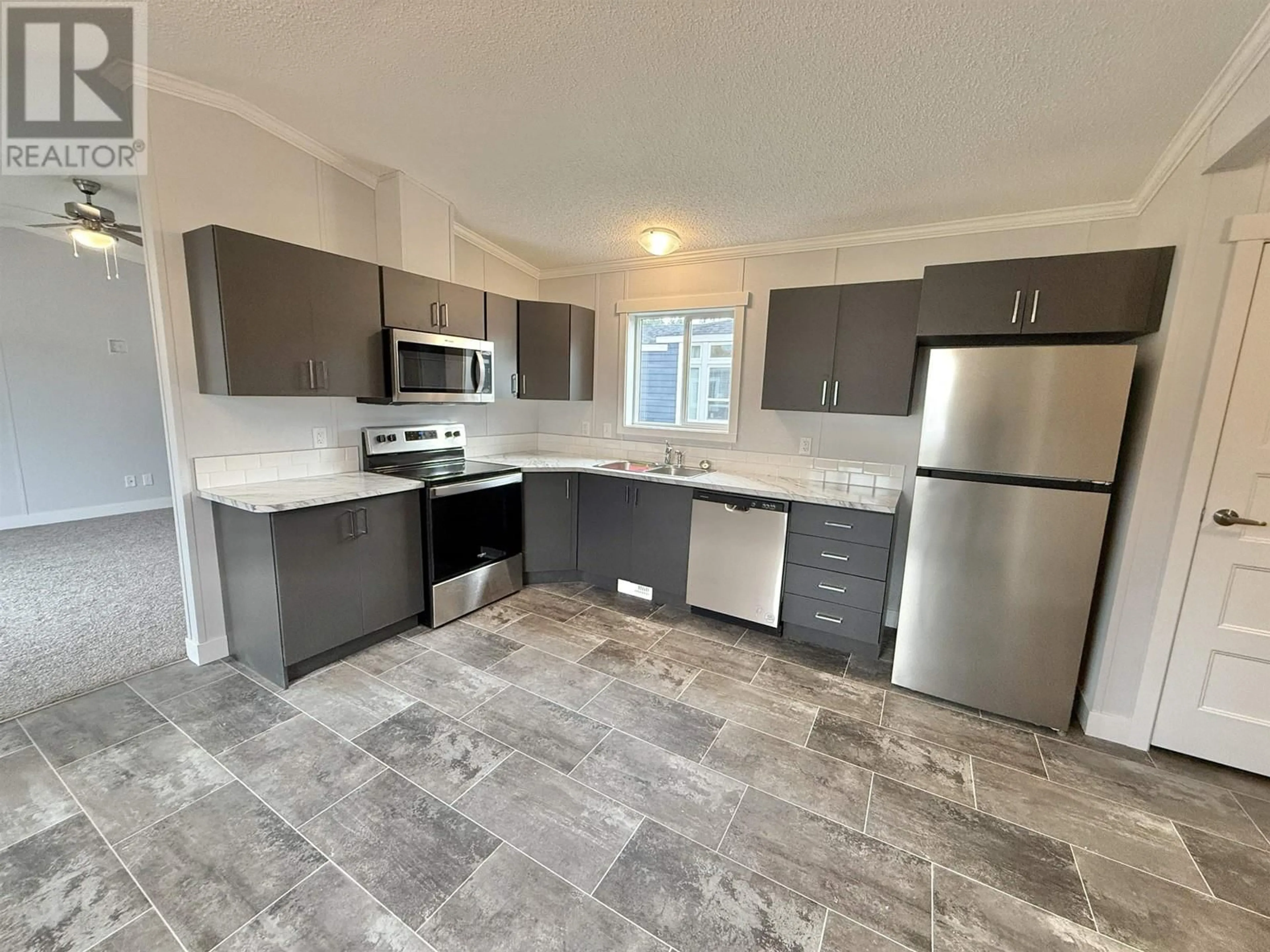 Open concept kitchen, ceramic/tile floor for 73 313 WESTLAND ROAD, Quesnel British Columbia V2J4V4