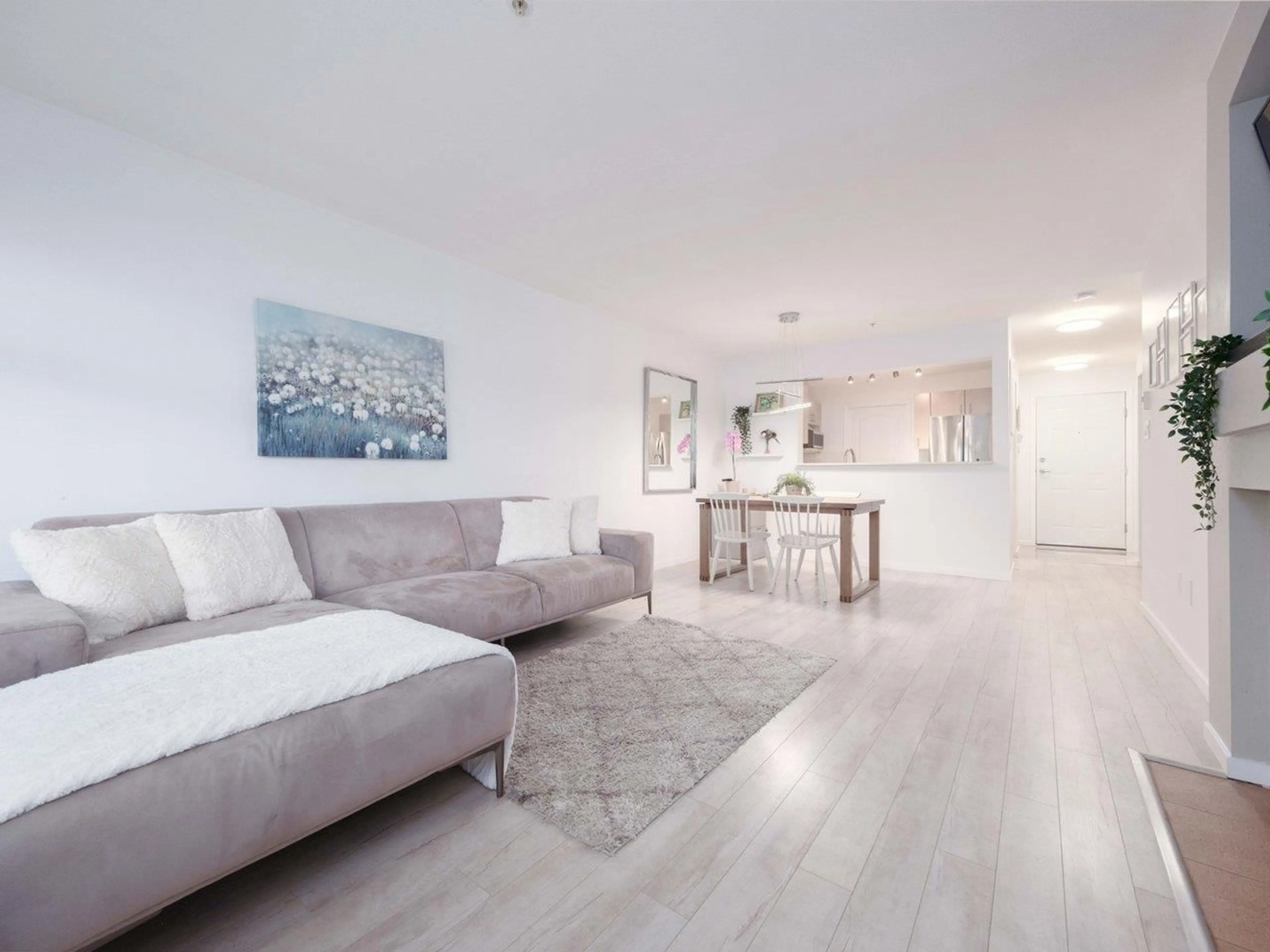 Living room, wood floors for 107 15210 GUILDFORD DRIVE, Surrey British Columbia V3R0X7