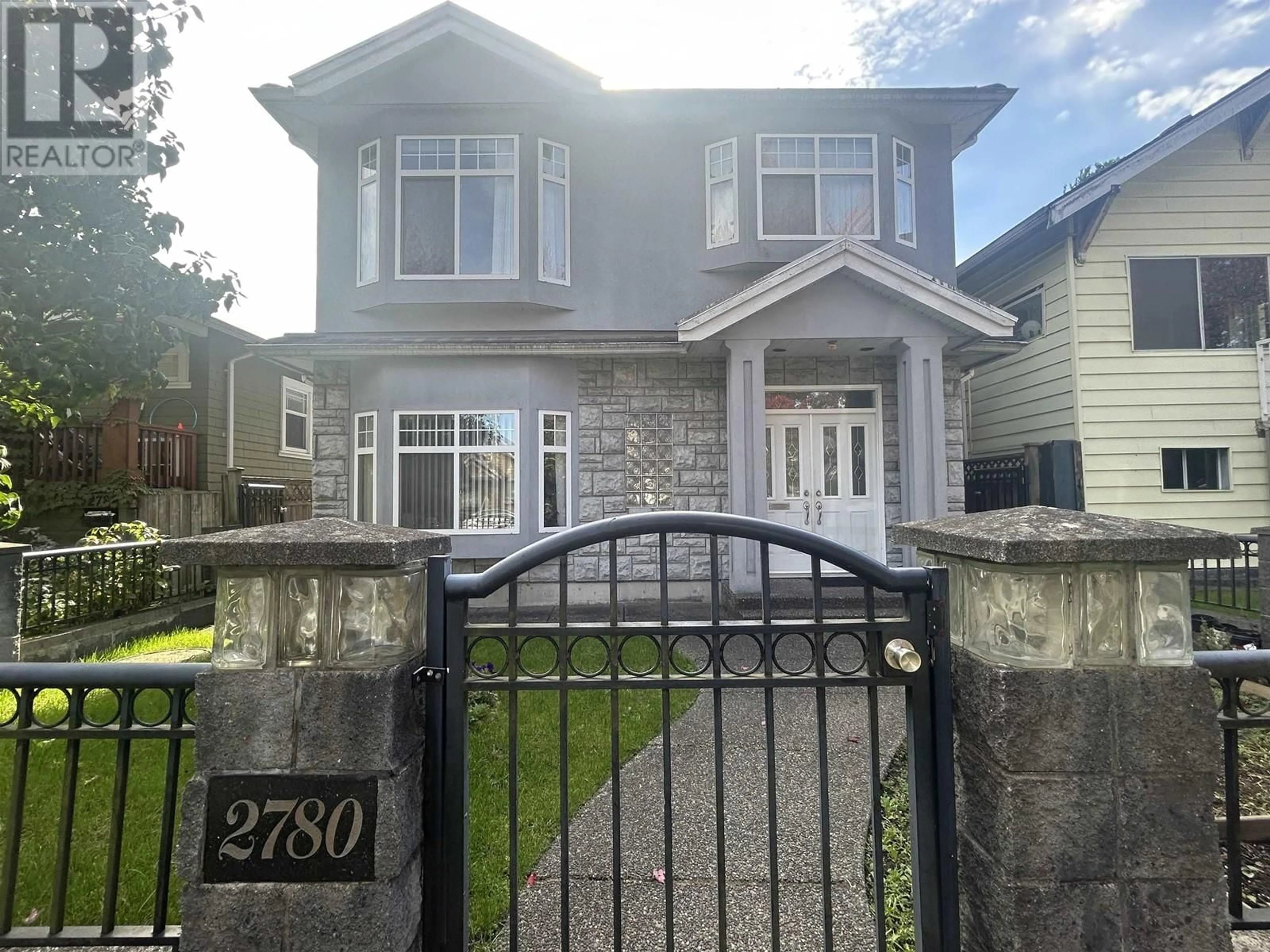 Frontside or backside of a home, the street view for 2780 PANDORA STREET, Vancouver British Columbia V5K1W1