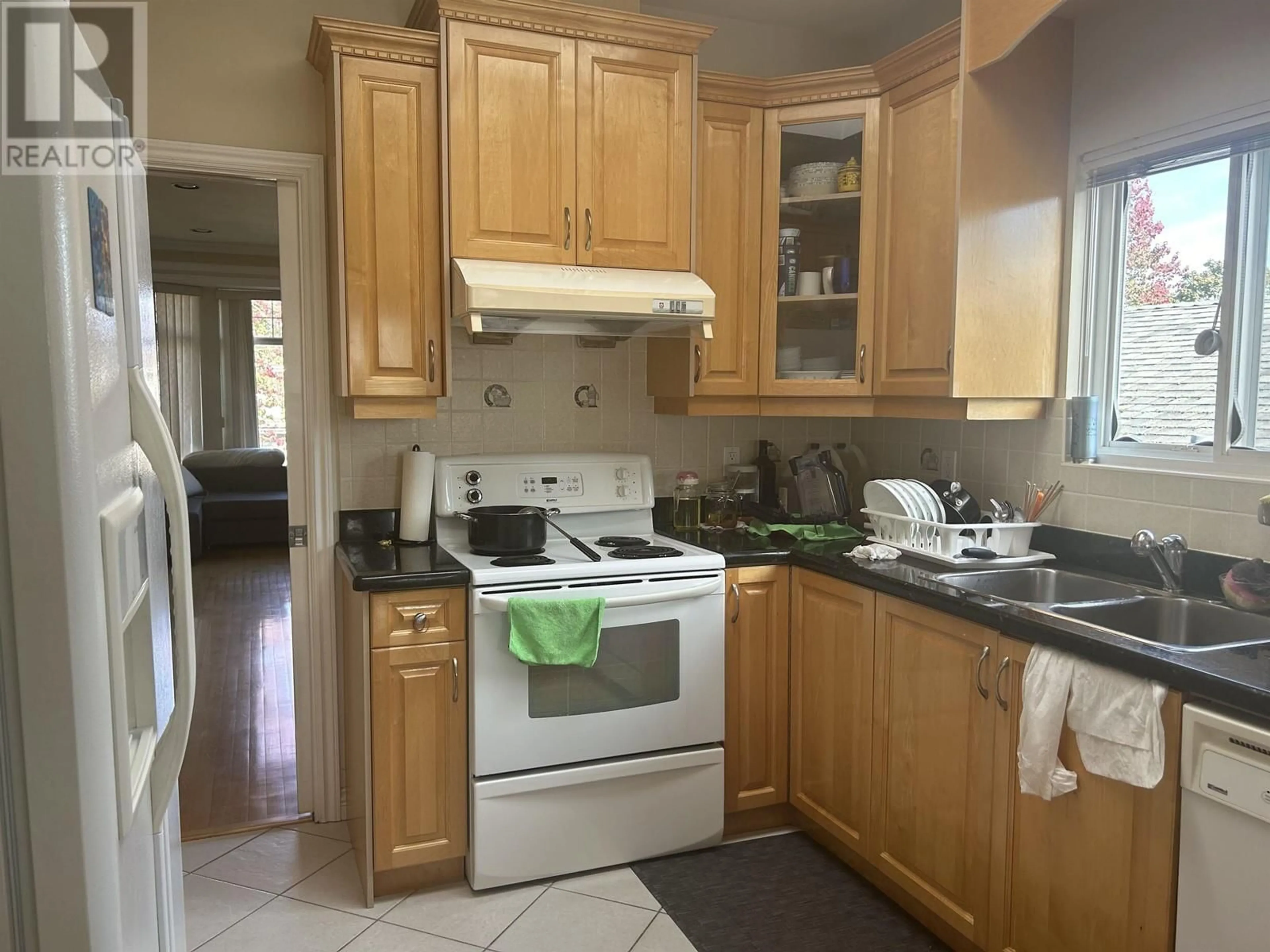 Standard kitchen, wood floors, cottage for 2780 PANDORA STREET, Vancouver British Columbia V5K1W1