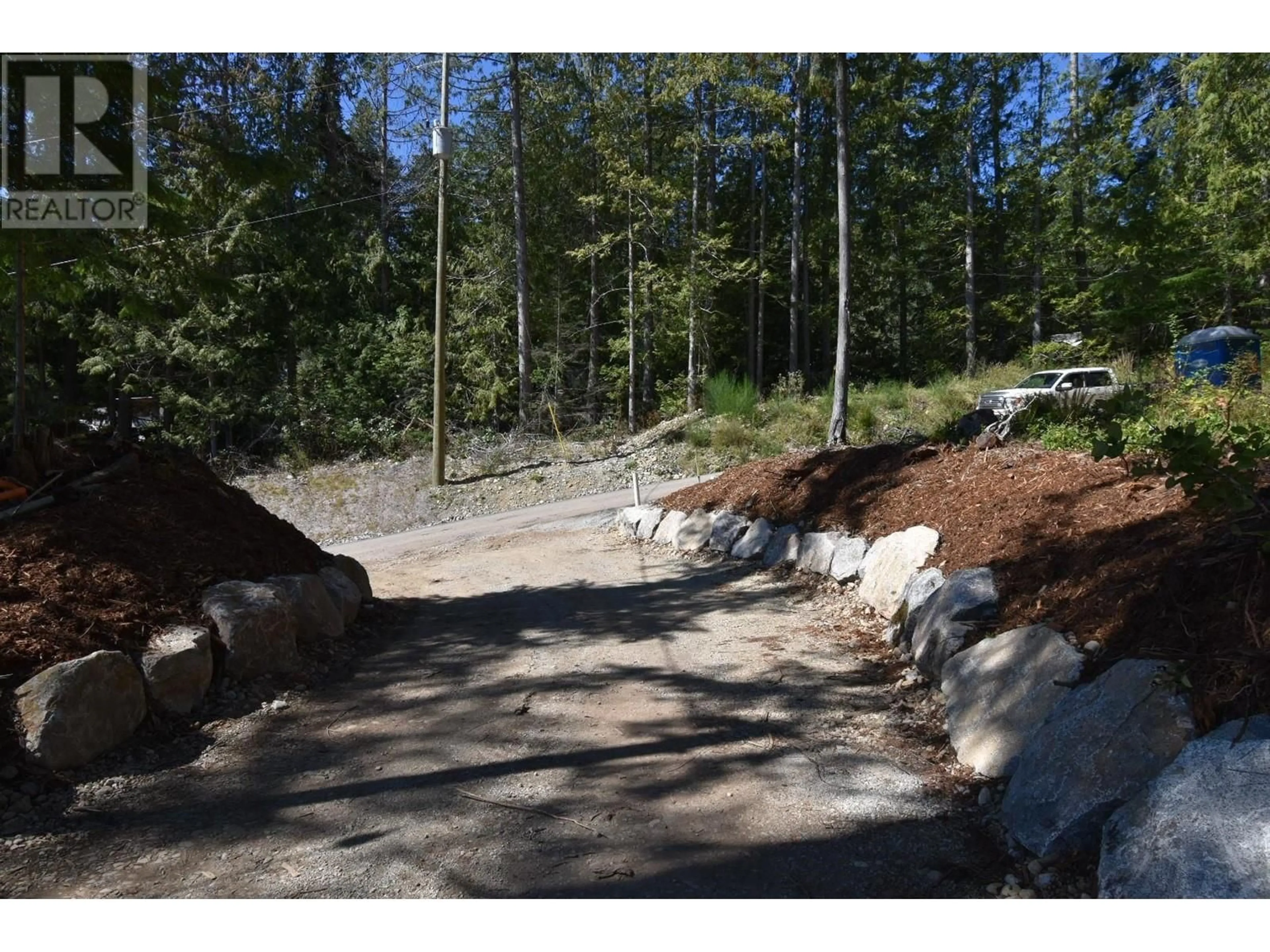 Patio, the street view for 5782 SARGEANT BAY HEIGHTS ROAD, Halfmoon Bay British Columbia V7Z1C3