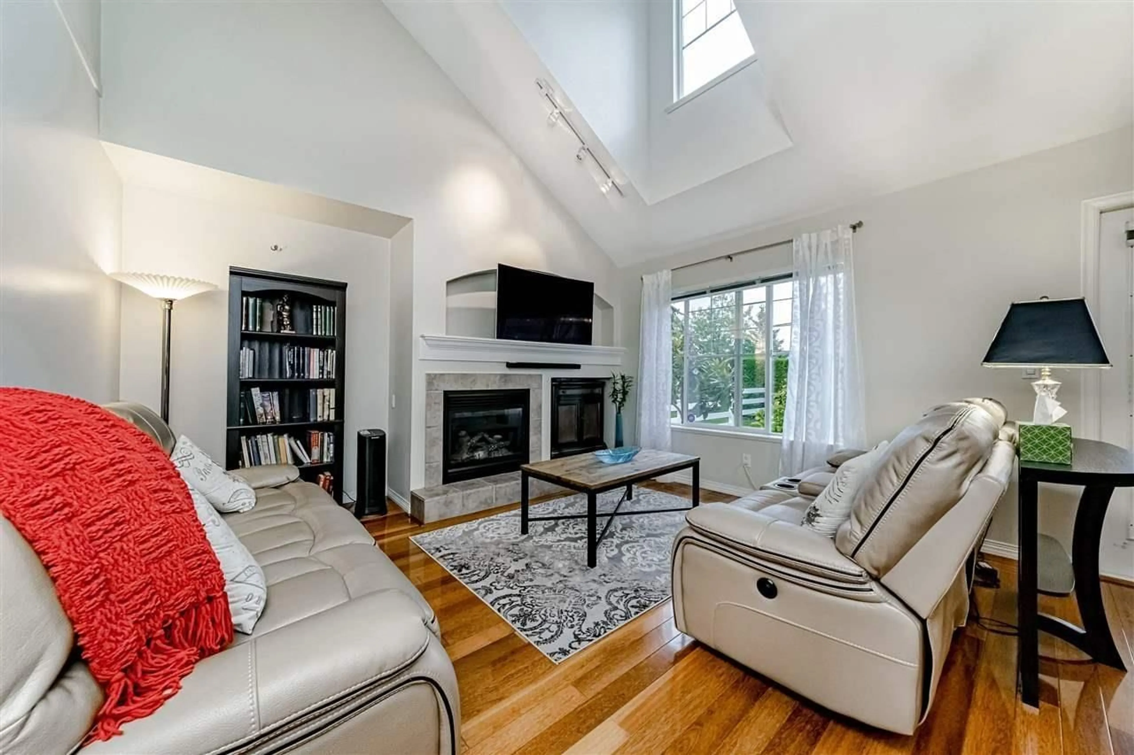 Living room, wood floors for 2 17097 64 AVENUE, Surrey British Columbia V3S1Y5