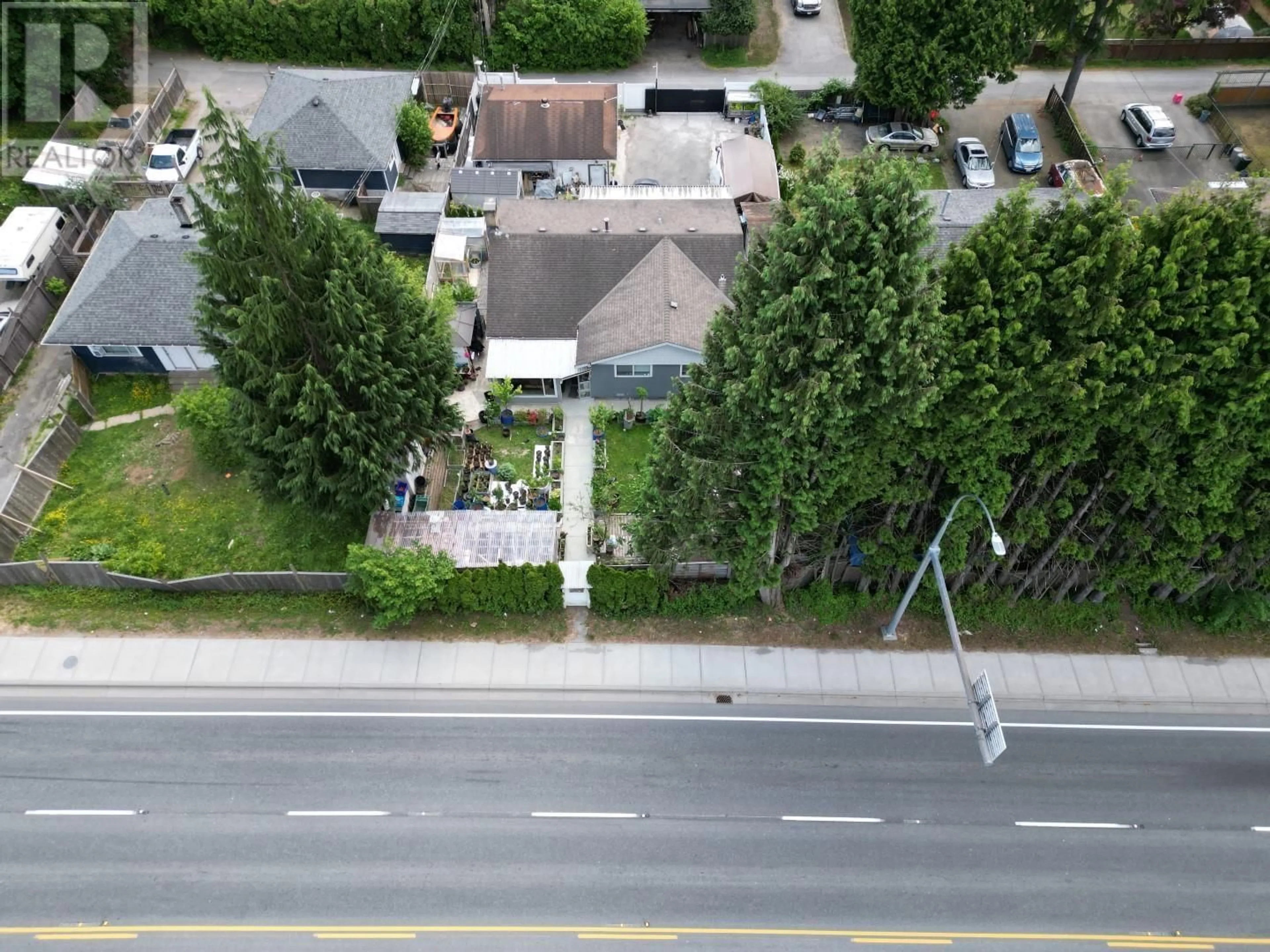 A pic from outside/outdoor area/front of a property/back of a property/a pic from drone, street for 22056 LOUGHEED HIGHWAY, Maple Ridge British Columbia V2X2S6