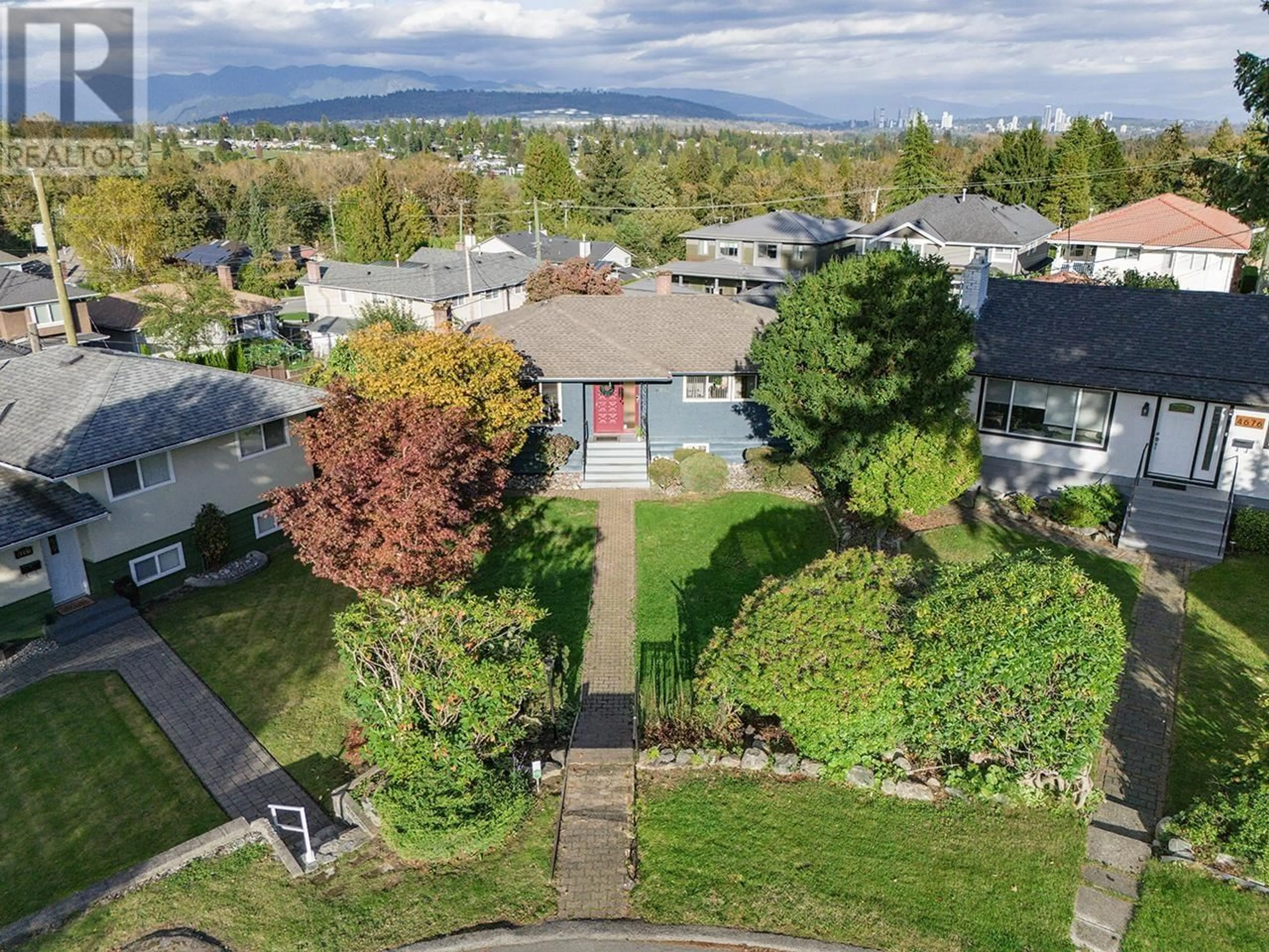 Frontside or backside of a home, the fenced backyard for 4667 CHARLOTTE COURT, Burnaby British Columbia V5G2V1