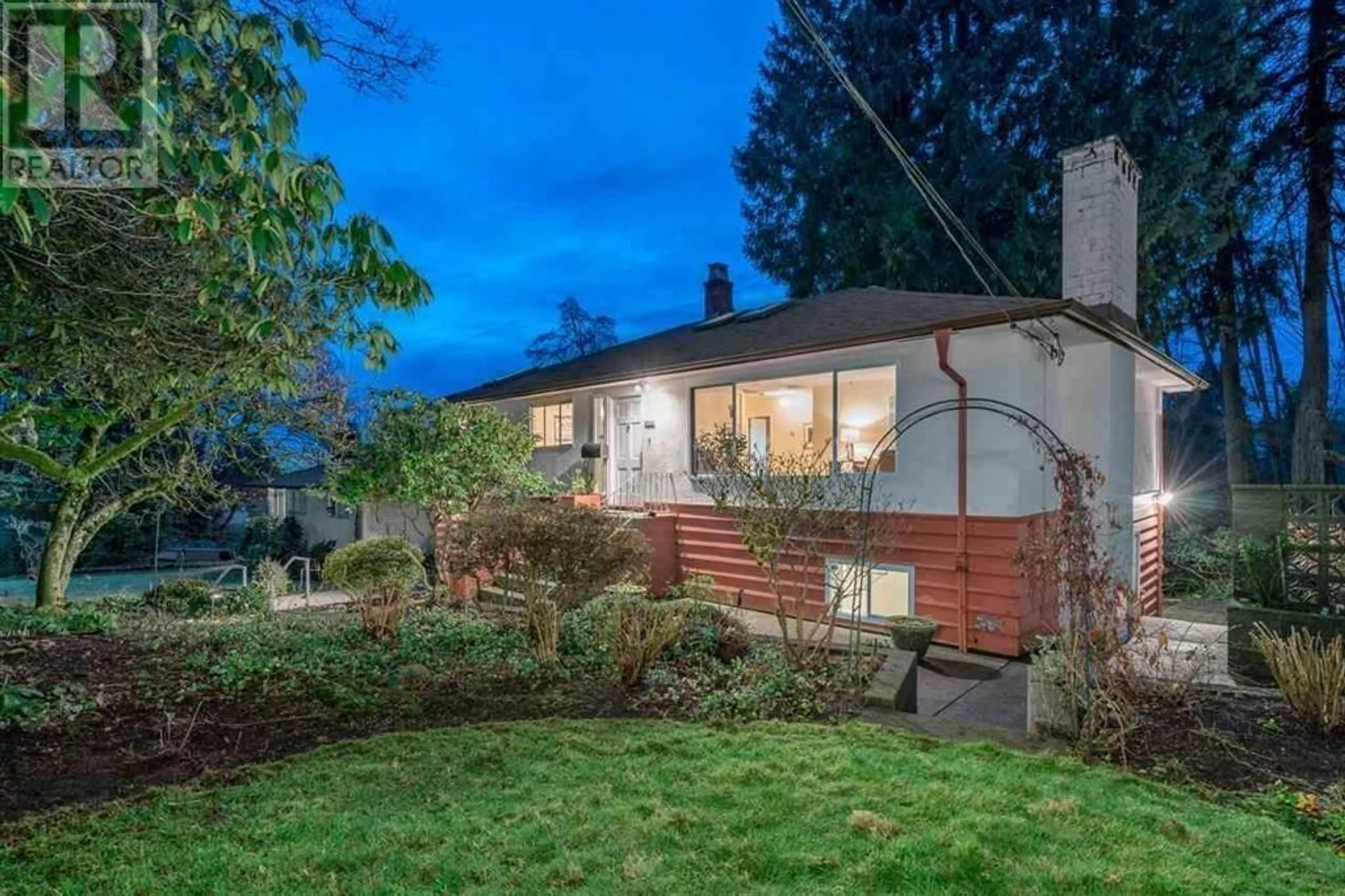 Frontside or backside of a home, the fenced backyard for 3737 CALDER AVENUE, North Vancouver British Columbia V7N3S1