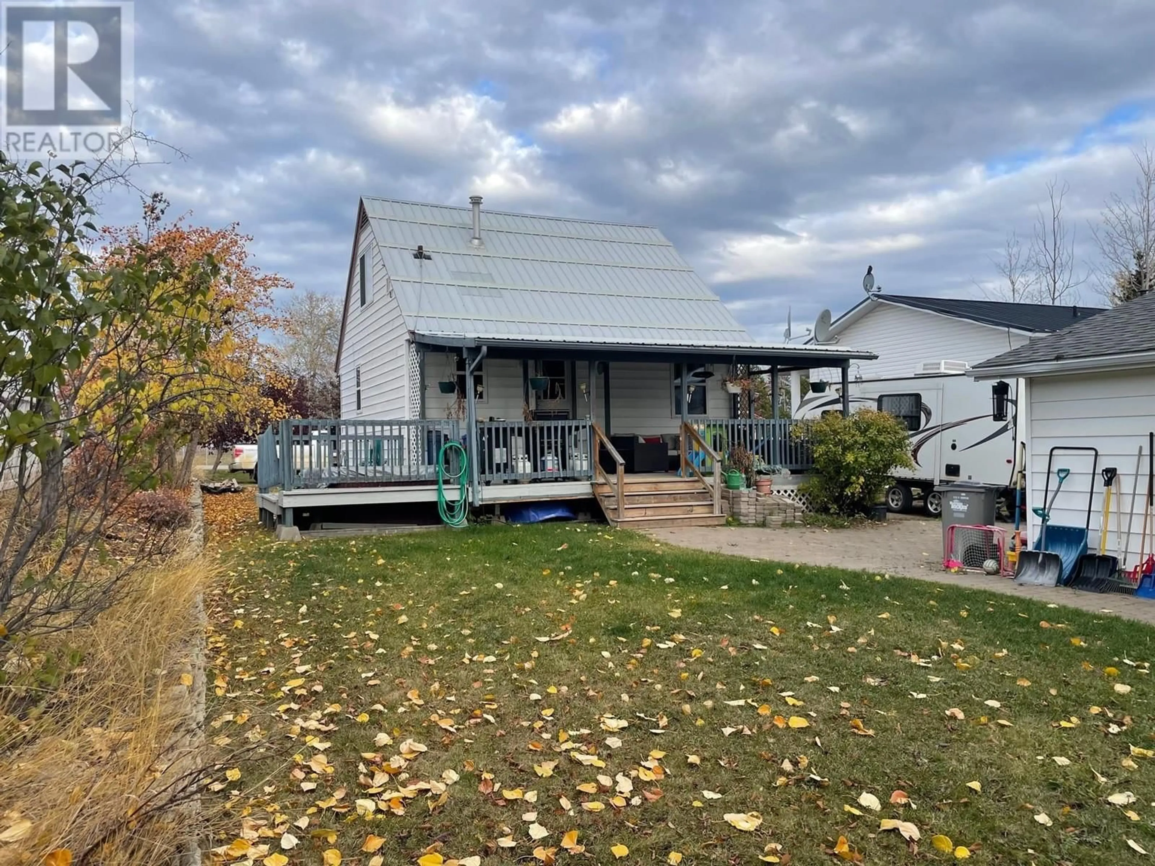 Frontside or backside of a home, cottage for 4711 SPRUCE AVENUE, Fort Nelson British Columbia V0C1R0