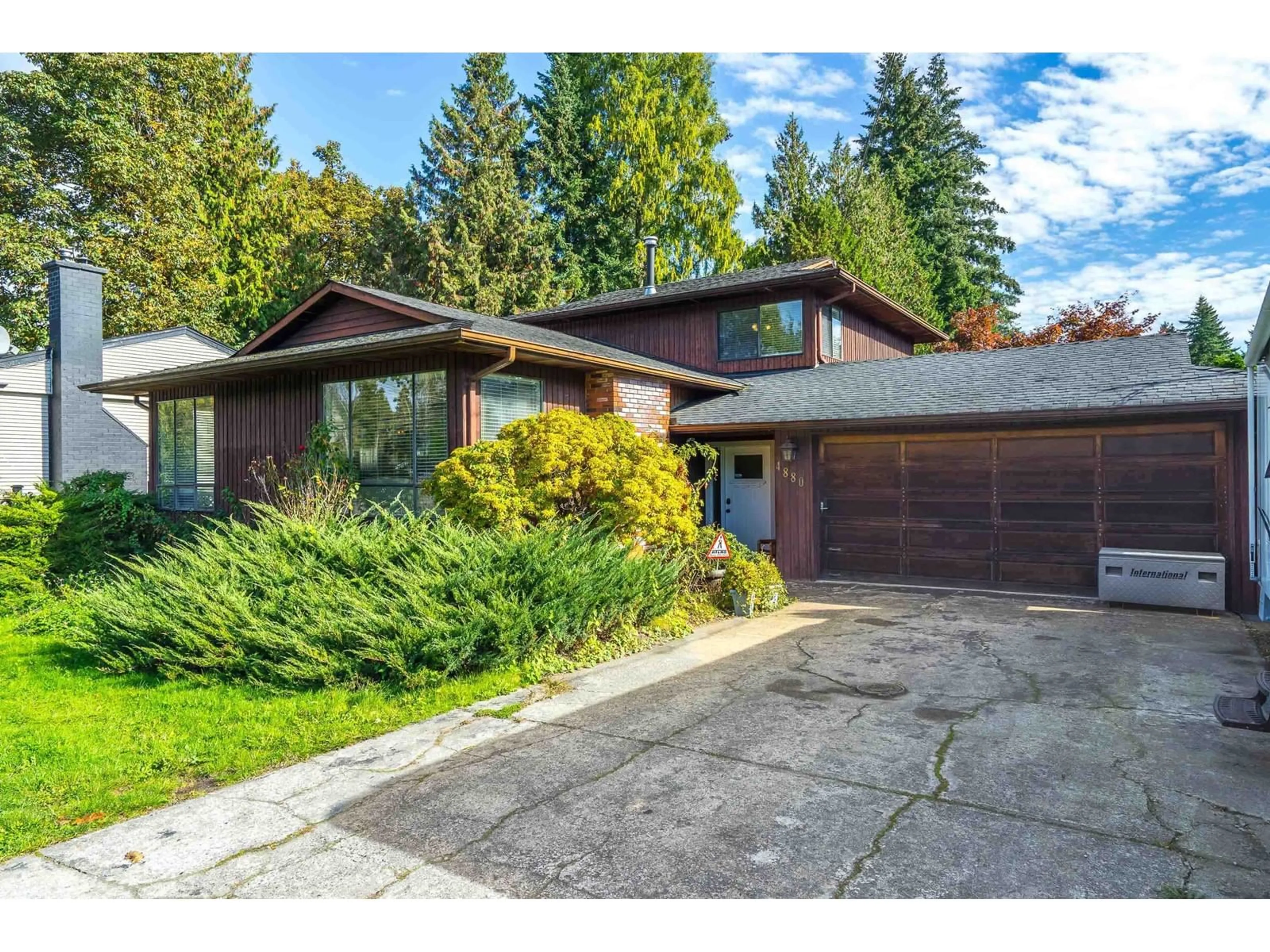 Frontside or backside of a home, the street view for 4880 200 STREET, Langley British Columbia V3A1L5