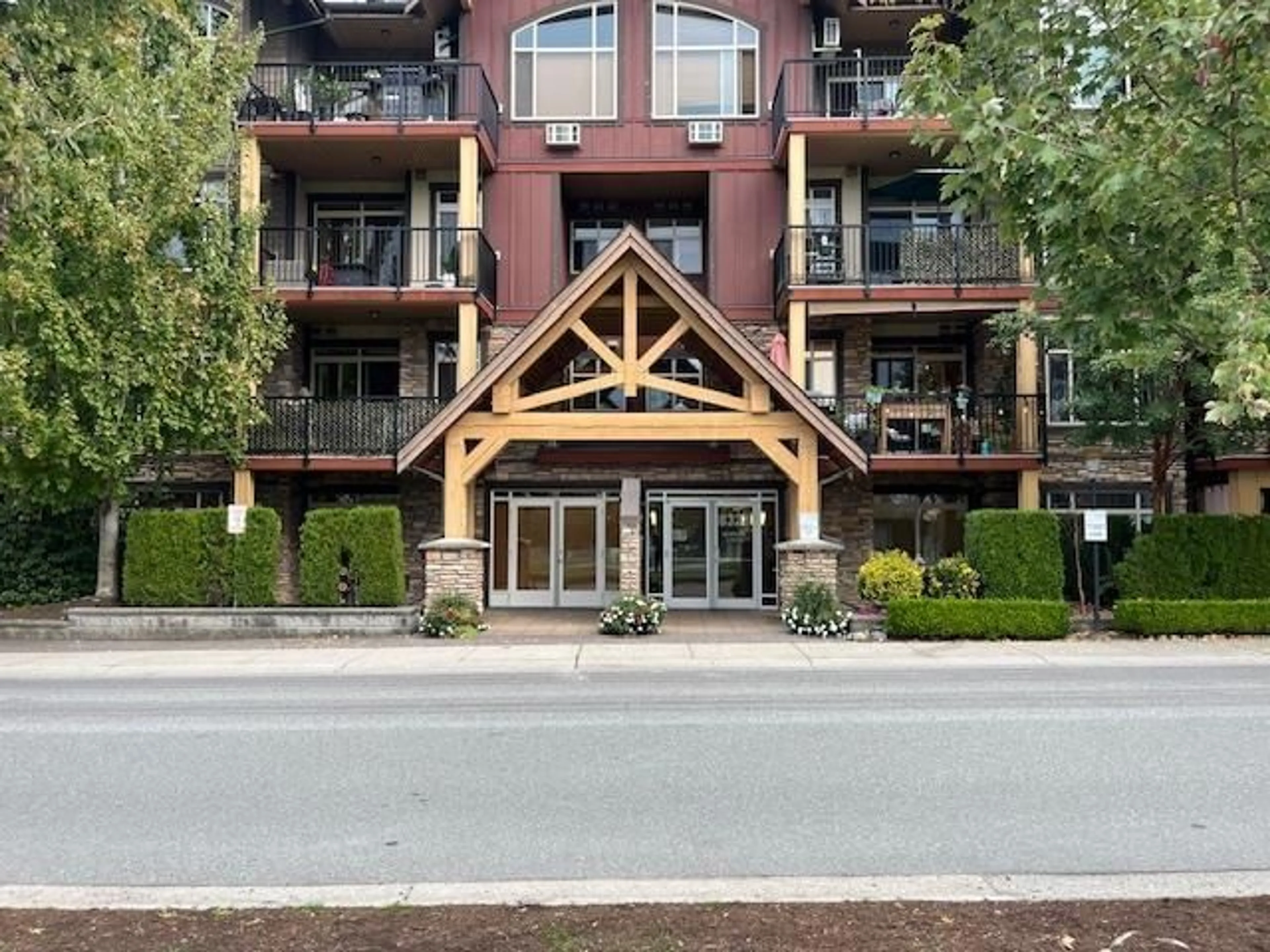 A pic from exterior of the house or condo, the front or back of building for 403 8328 207A STREET, Langley British Columbia V2Y0K5