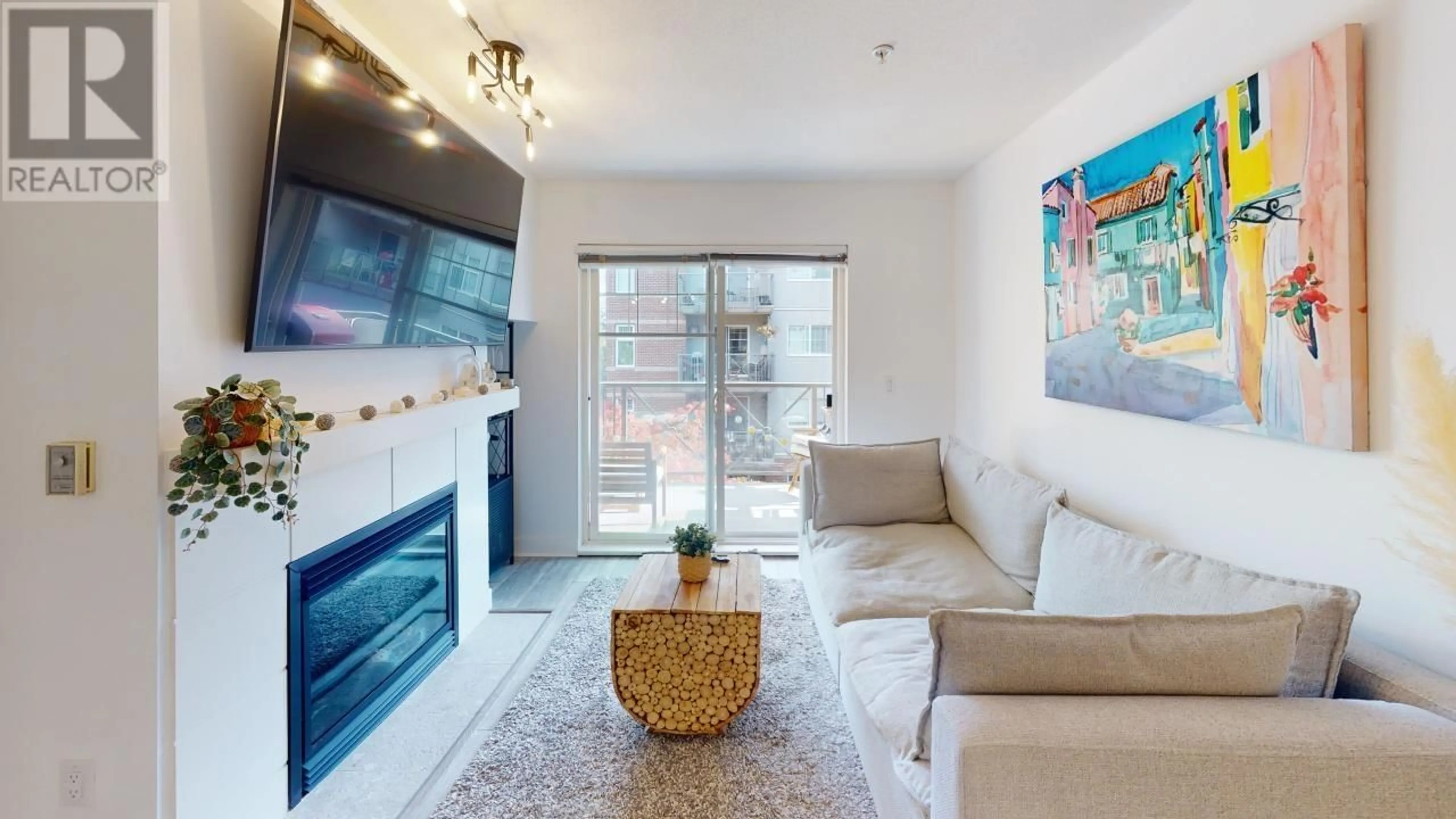 Living room, wood floors for 307 3240 ST JOHNS STREET, Port Moody British Columbia V3H0C1