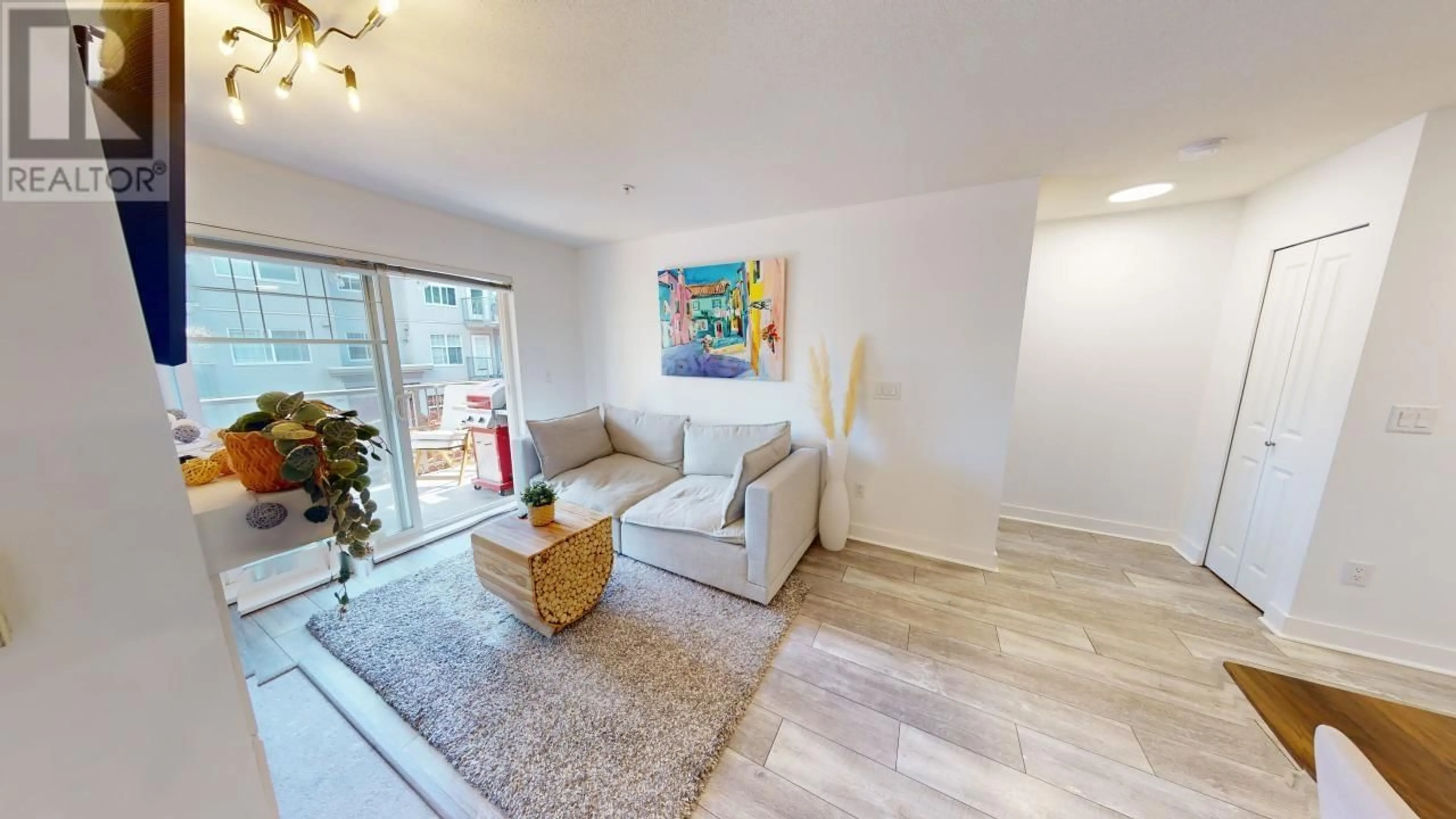 Living room, wood floors for 307 3240 ST JOHNS STREET, Port Moody British Columbia V3H0C1