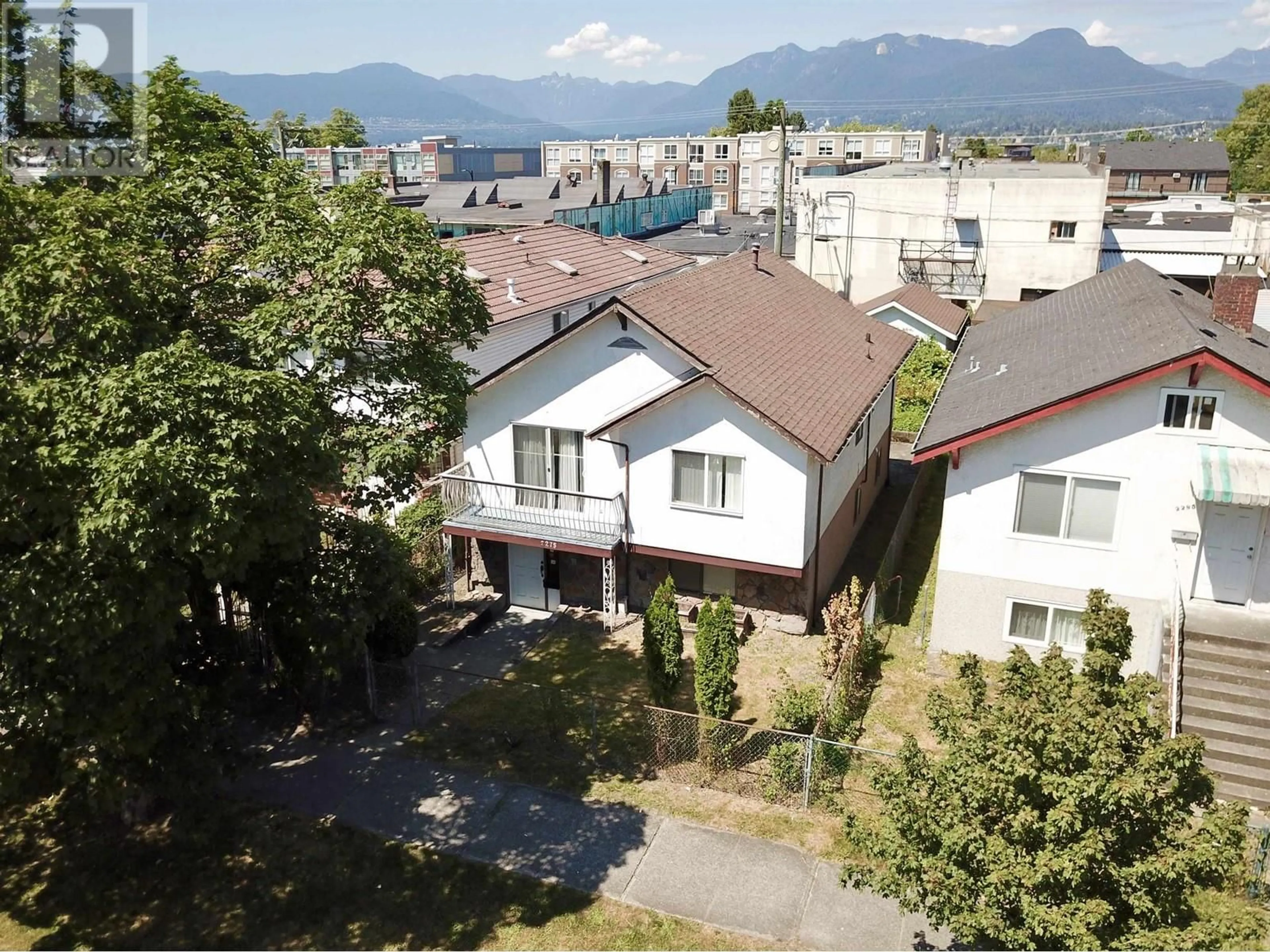 Frontside or backside of a home, the street view for 2275 E PENDER STREET, Vancouver British Columbia V5L1X5