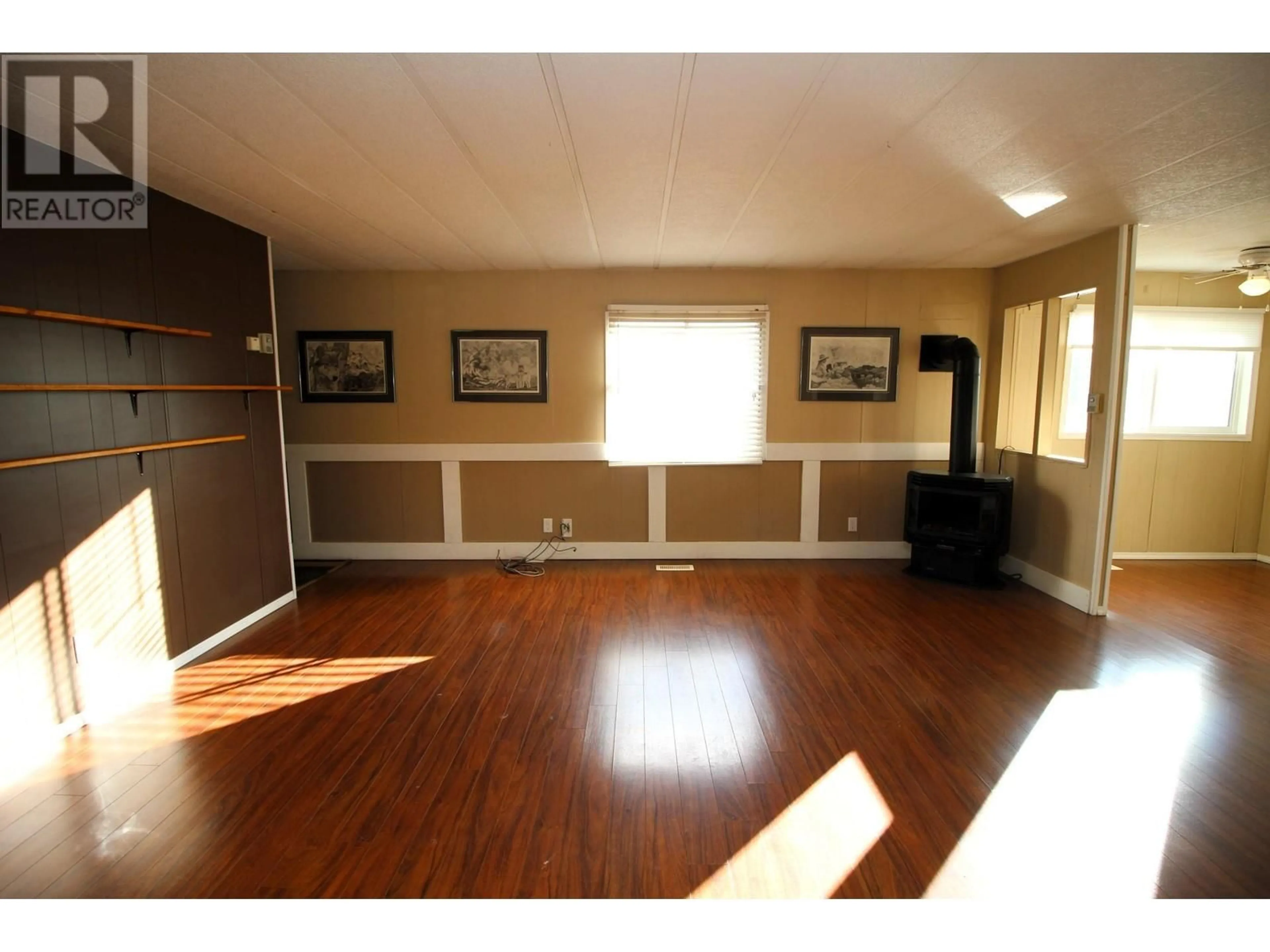 A pic of a room, wood floors for 162 3666 11TH STREET, Houston British Columbia V0J1Z0