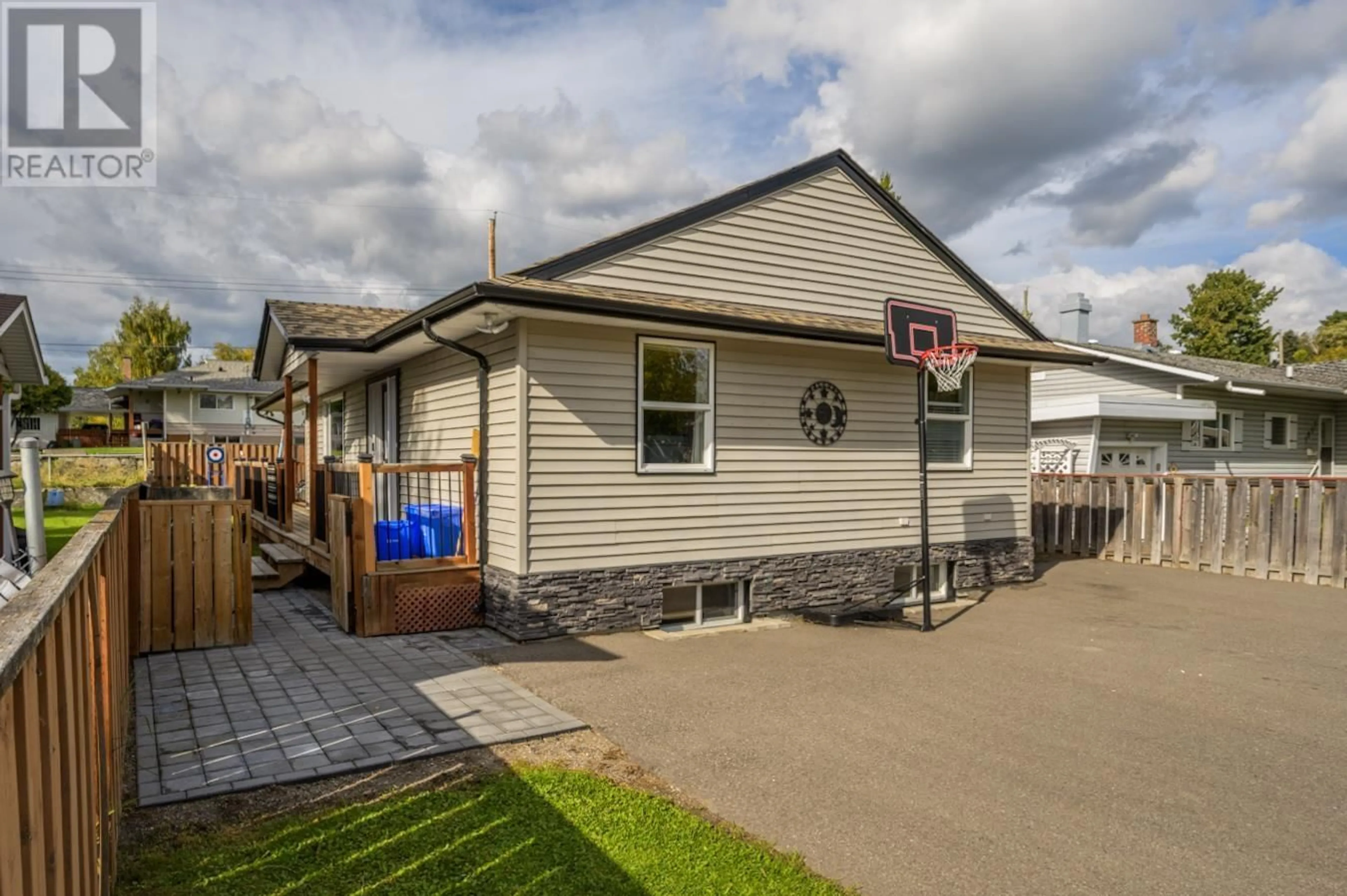 Frontside or backside of a home, the fenced backyard for 1869 KENWOOD STREET, Prince George British Columbia V2L1S4