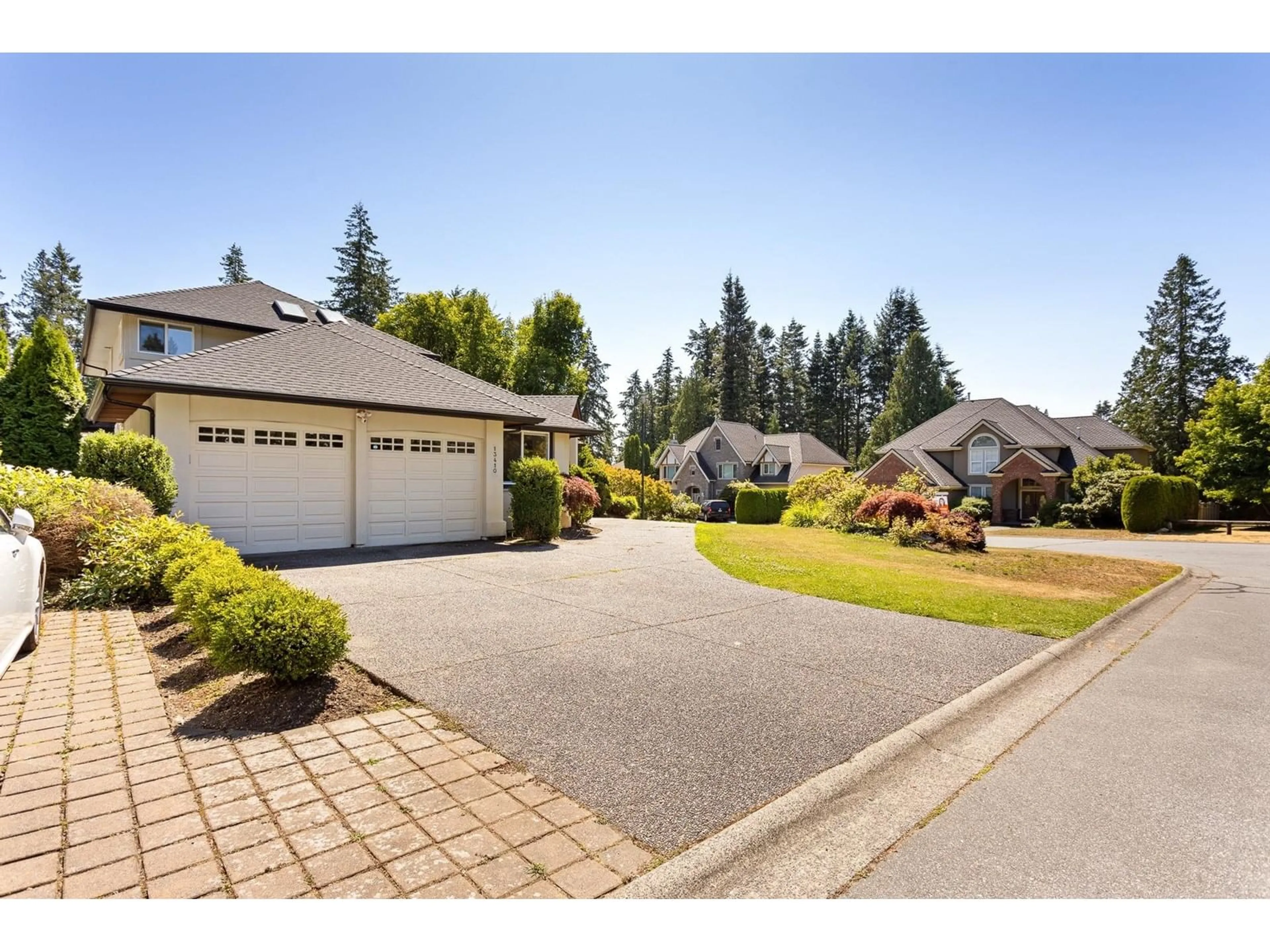 Frontside or backside of a home, the fenced backyard for 13410 16A AVENUE, Surrey British Columbia V4A9R4