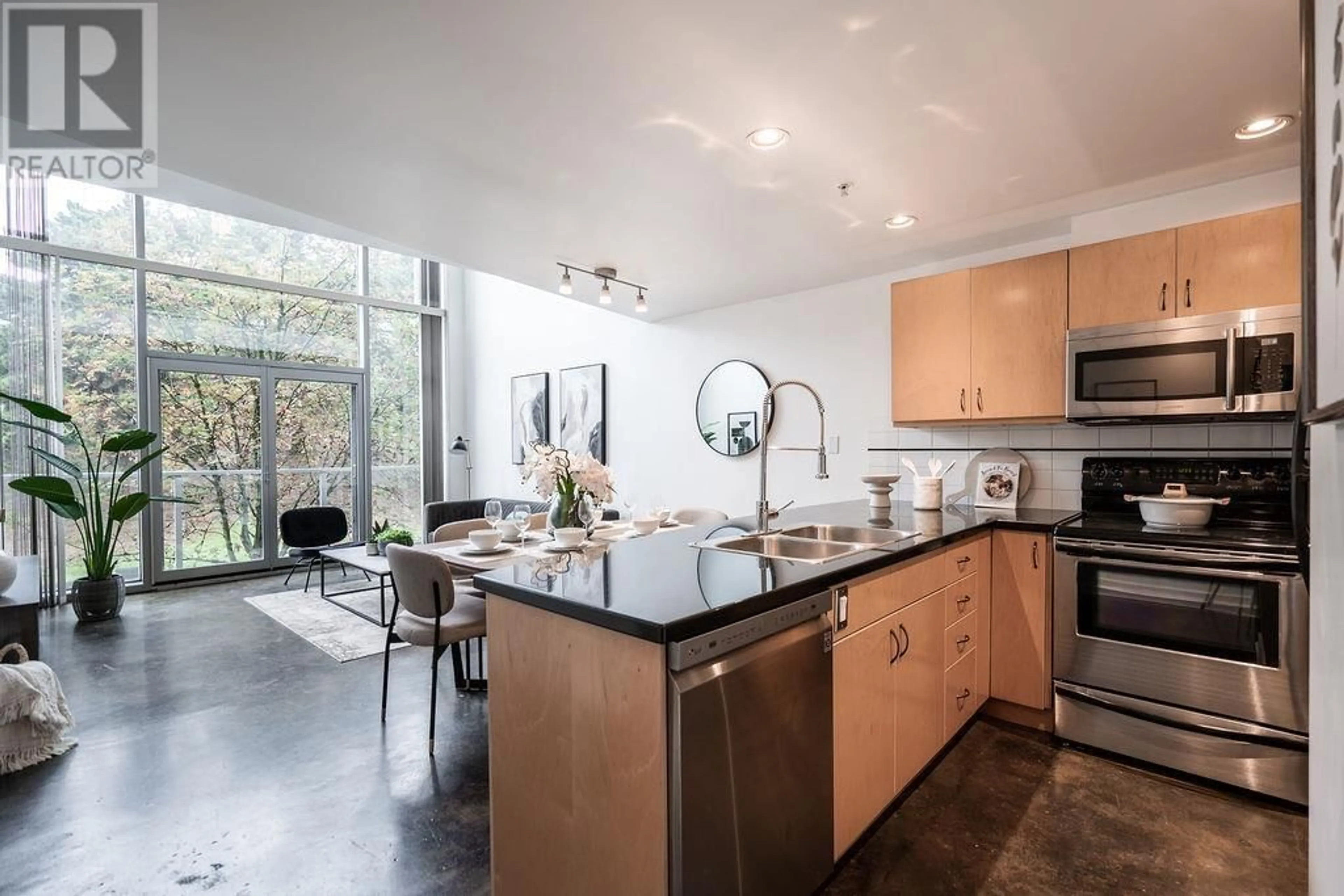 Open concept kitchen for 204 919 STATION STREET, Vancouver British Columbia V6A4L9