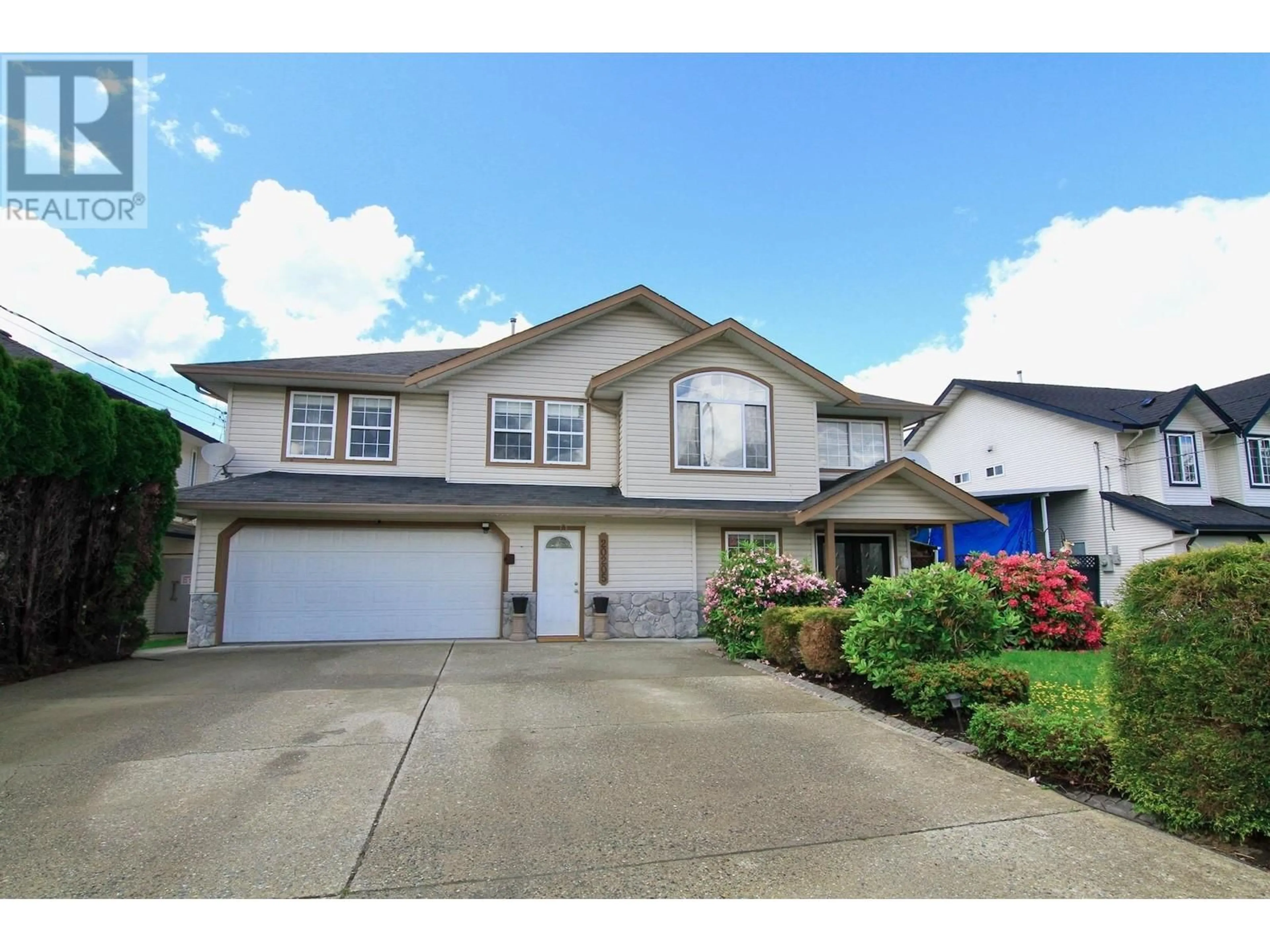 Frontside or backside of a home, the street view for 20205 DITTON STREET, Maple Ridge British Columbia V2X3N1