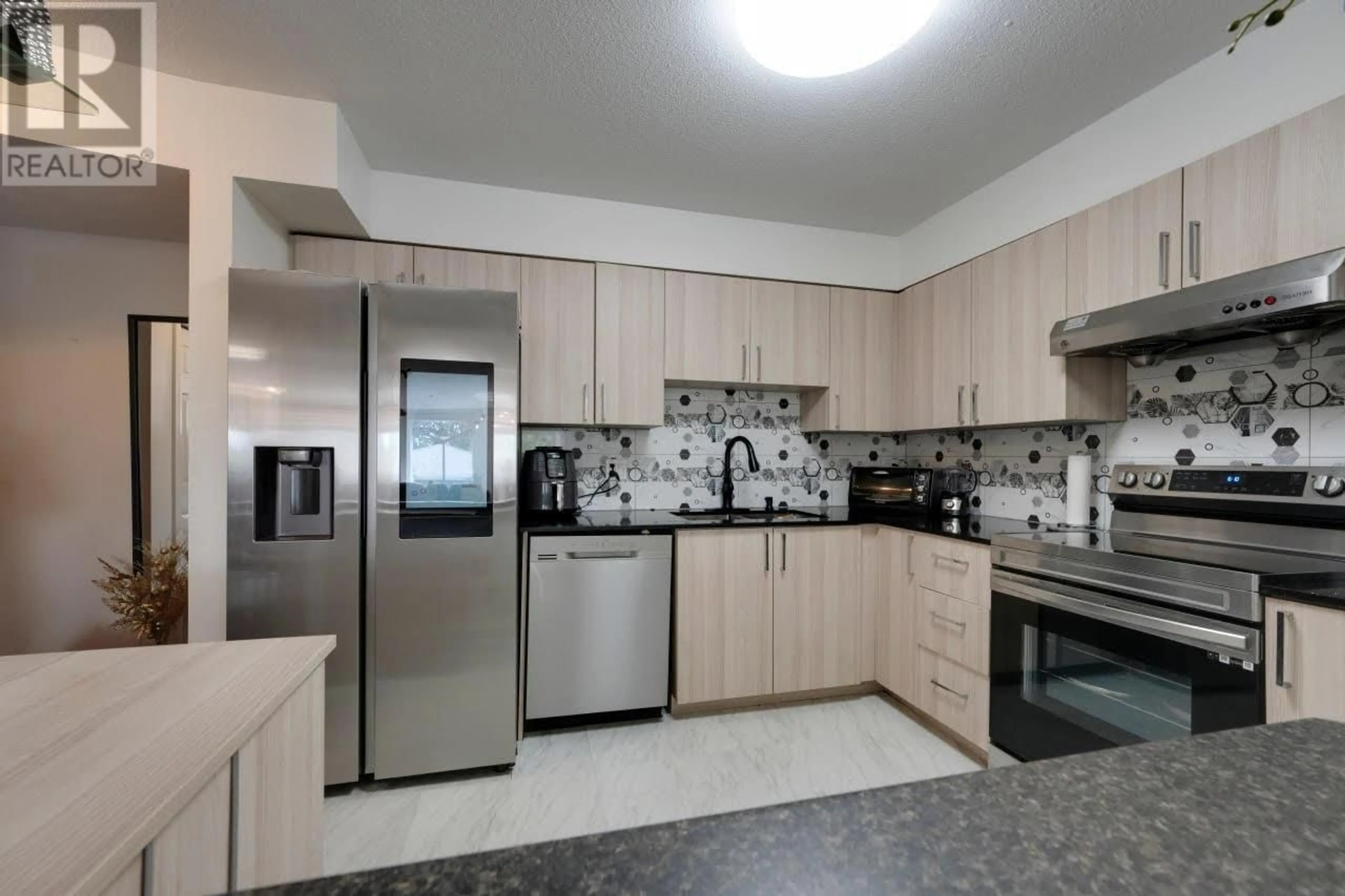 Kitchen, wood floors, cottage for 1108 O'FLAHERTY GATE, Port Coquitlam British Columbia V3C6H2