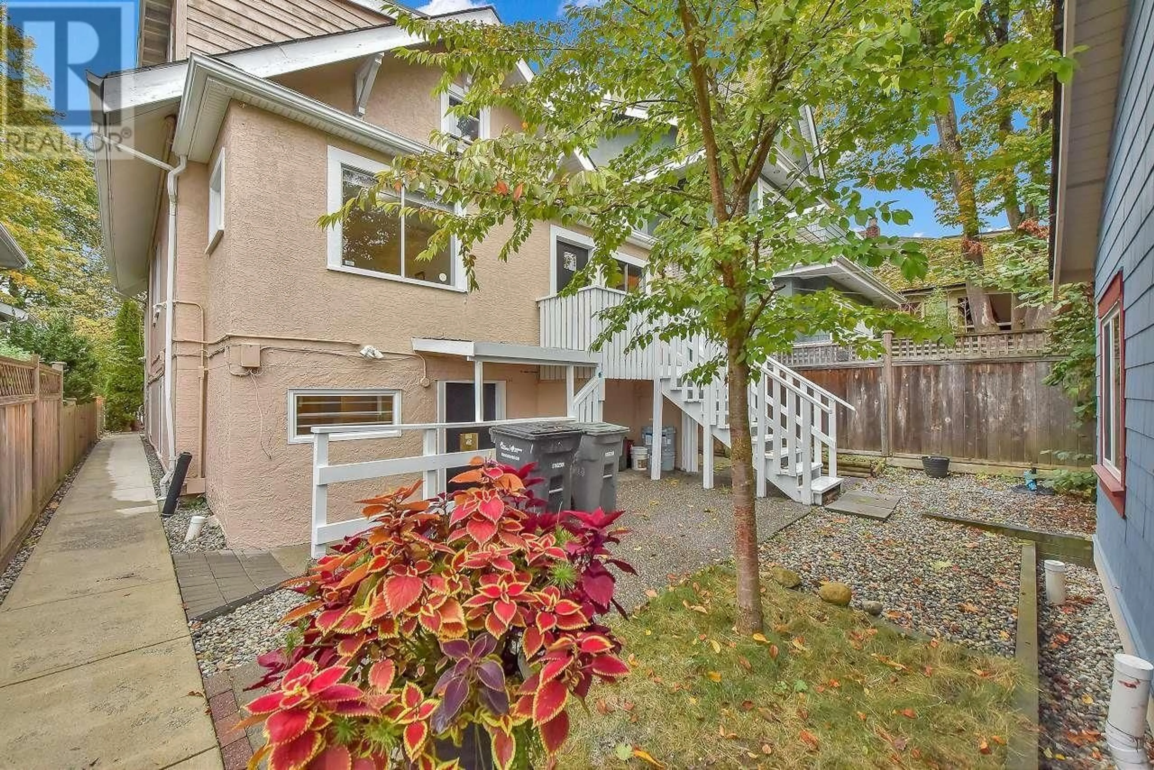 A pic from exterior of the house or condo, the fenced backyard for 638 W 17TH AVENUE, Vancouver British Columbia V5Z1T8