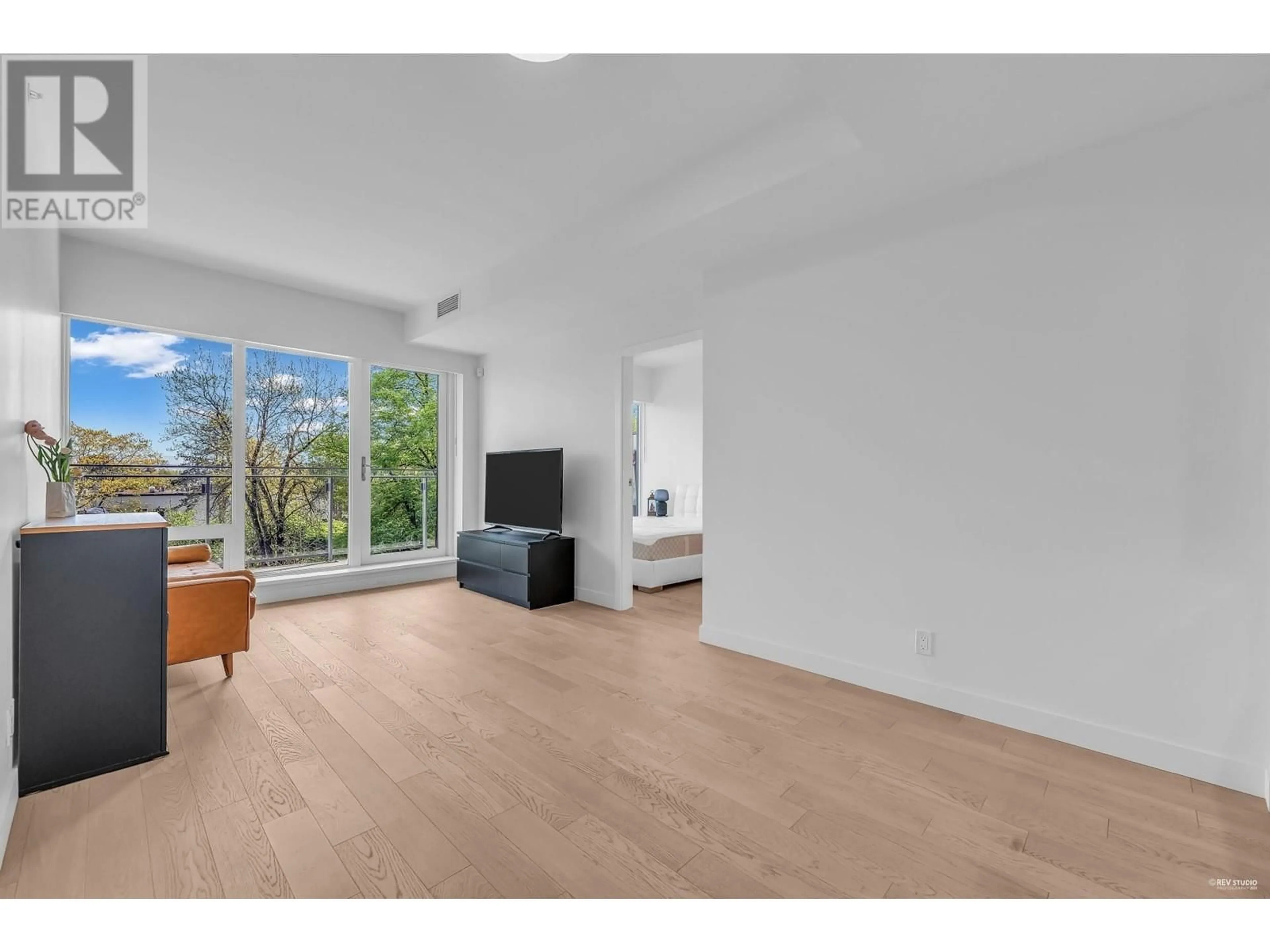 A pic of a room, wood floors for 305 6833 PEARSON WAY, Richmond British Columbia V7C0E8