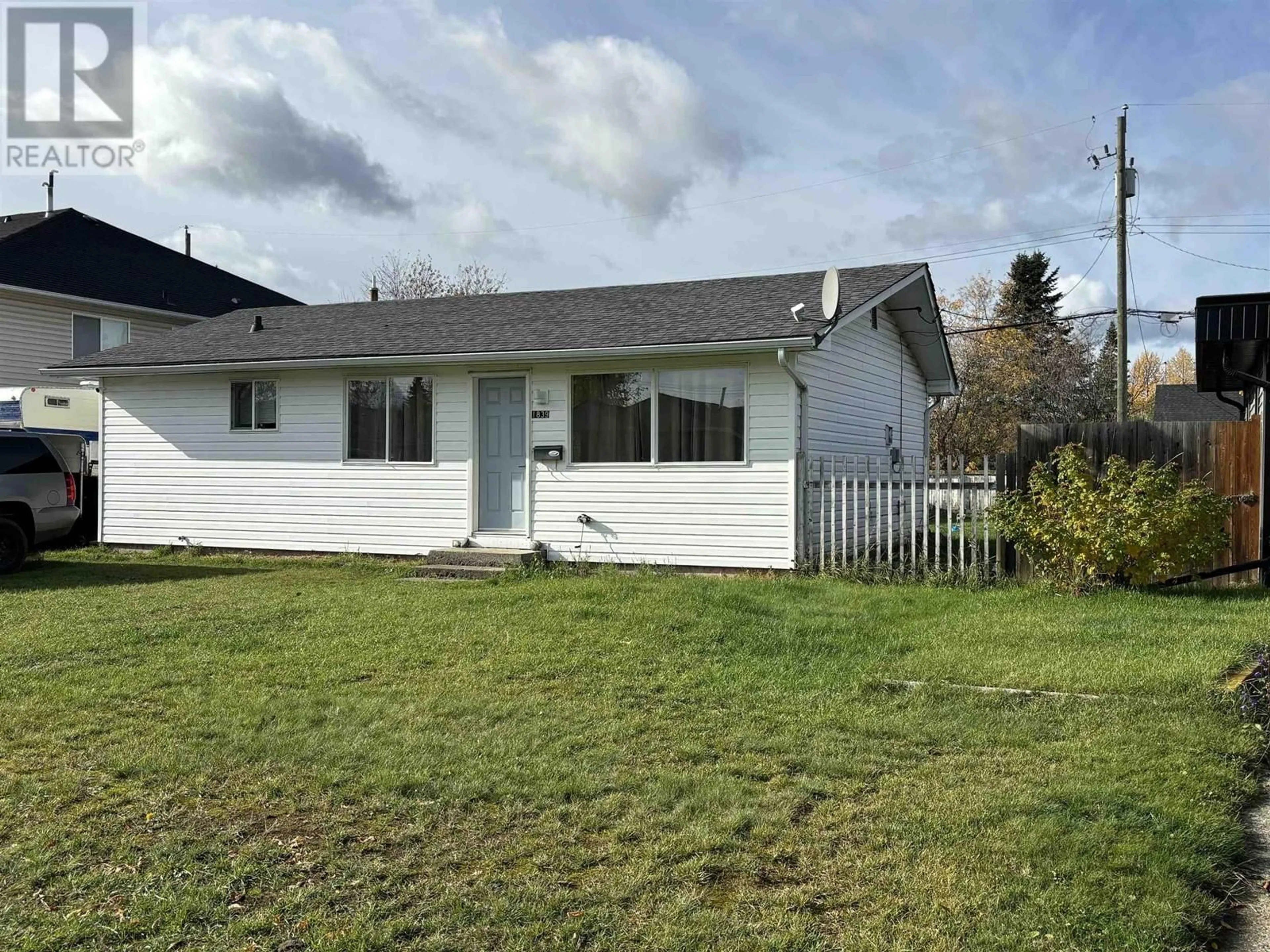 Frontside or backside of a home, the fenced backyard for 1839 TAMARACK STREET, Prince George British Columbia V2L2T5