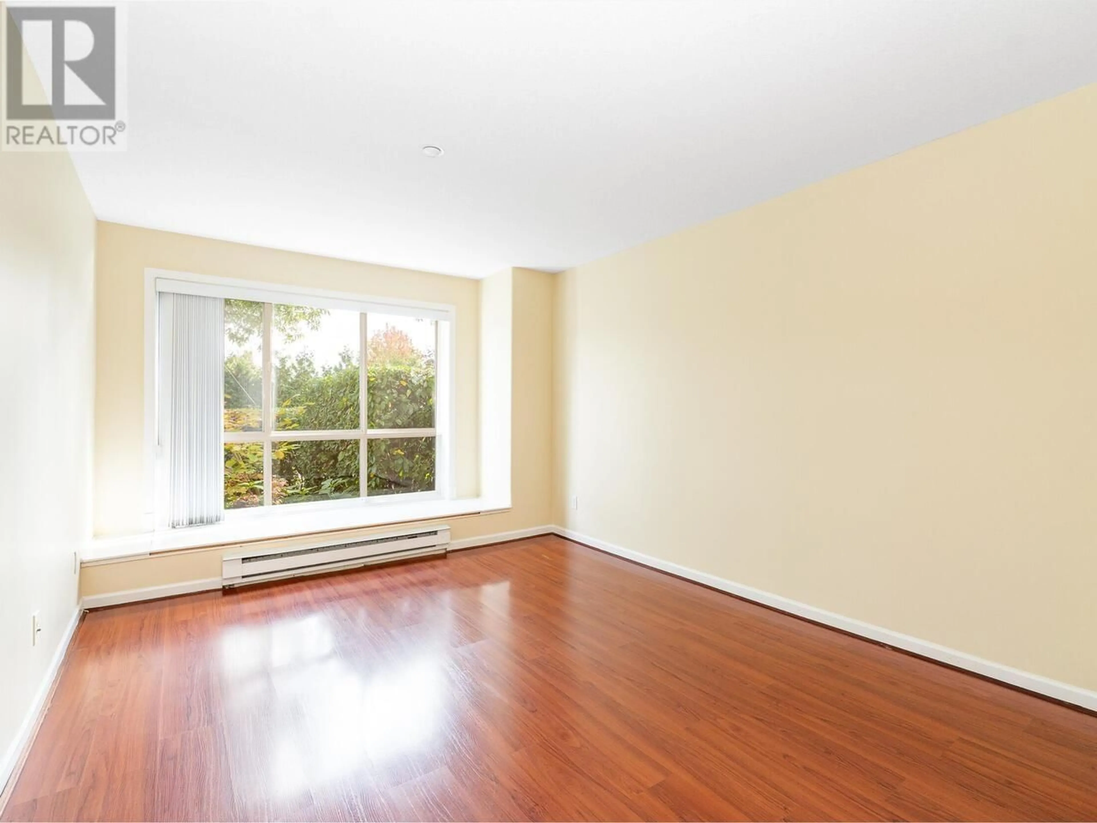 A pic of a room, wood floors for 107 12633 NO. 2 ROAD, Richmond British Columbia V7E6N5